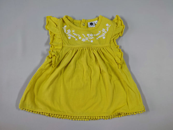 Robe m.c jaune motifs fleuris blancs sur le haut petits pompons sur le bord, moins cher chez Petit Kiwi