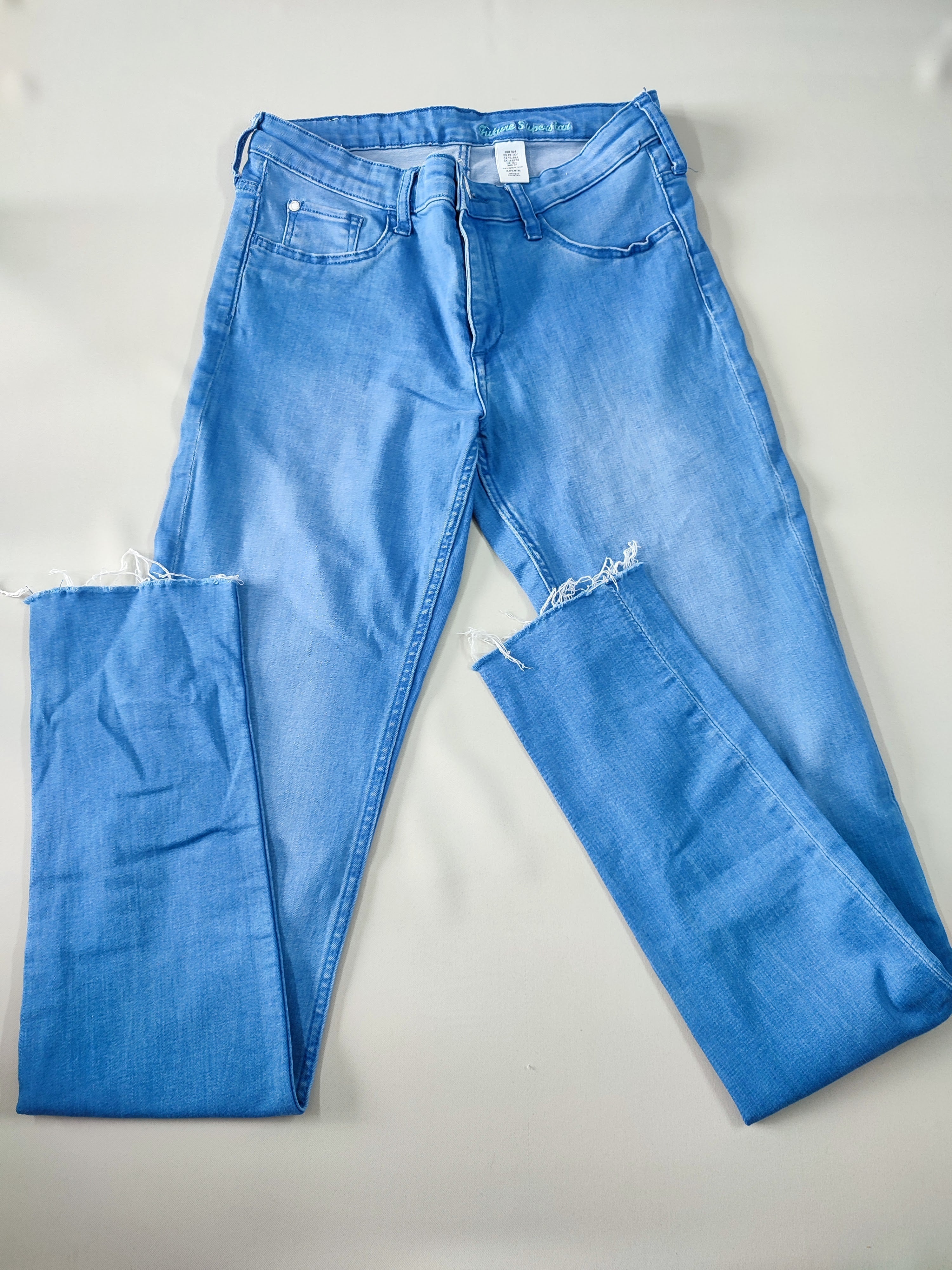 Jeans bleu skinny fit effet découpé cheville