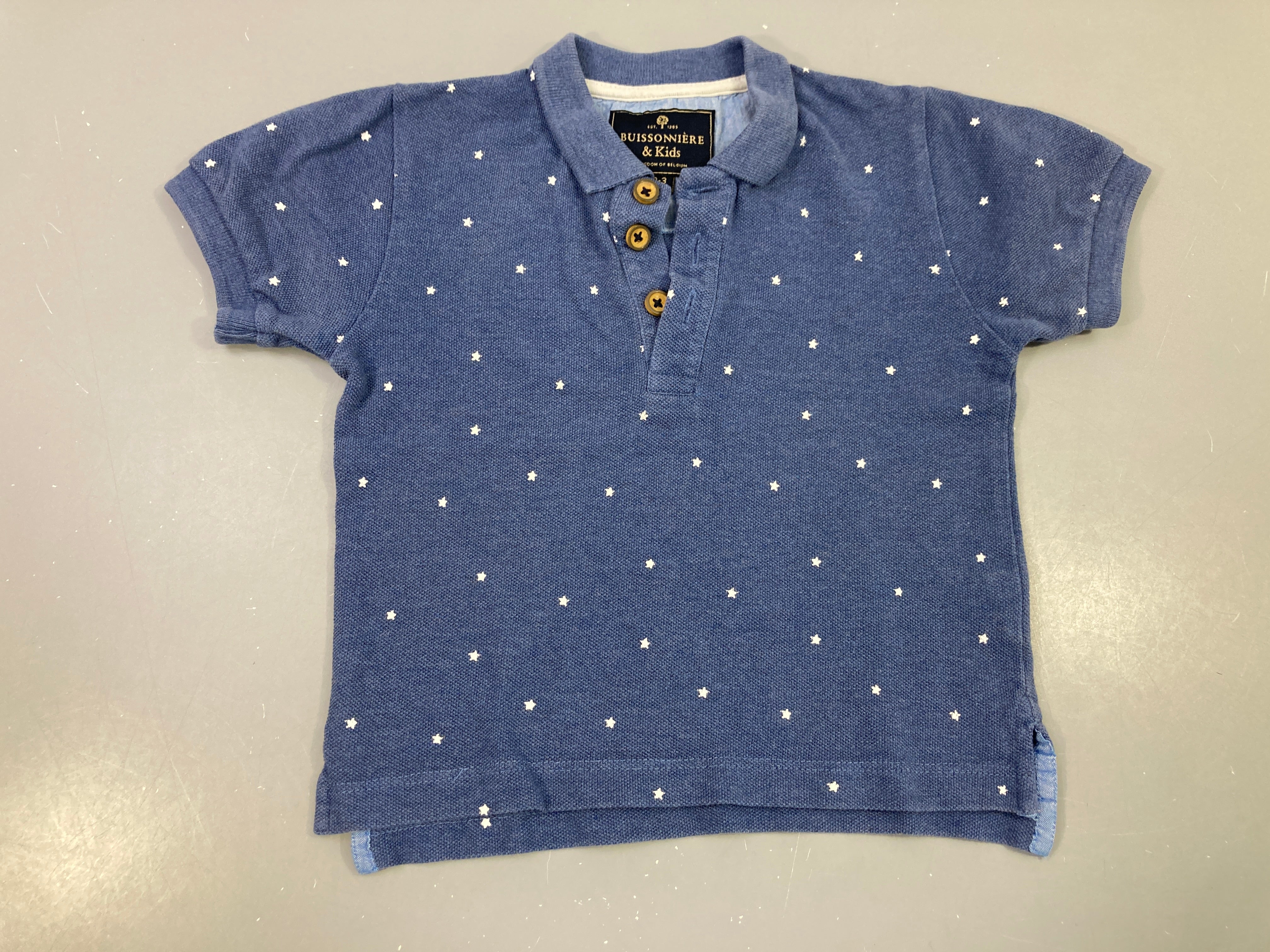 Polo m.c bleu étoiles blanches