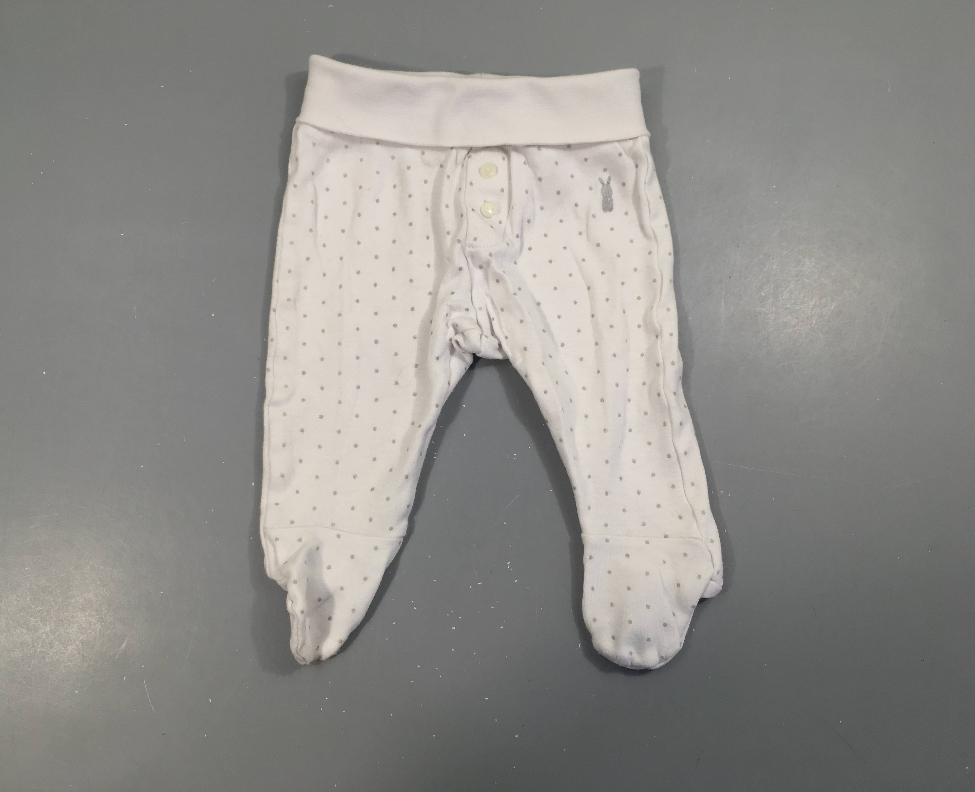 Pantalon à pieds jersey blanc pois