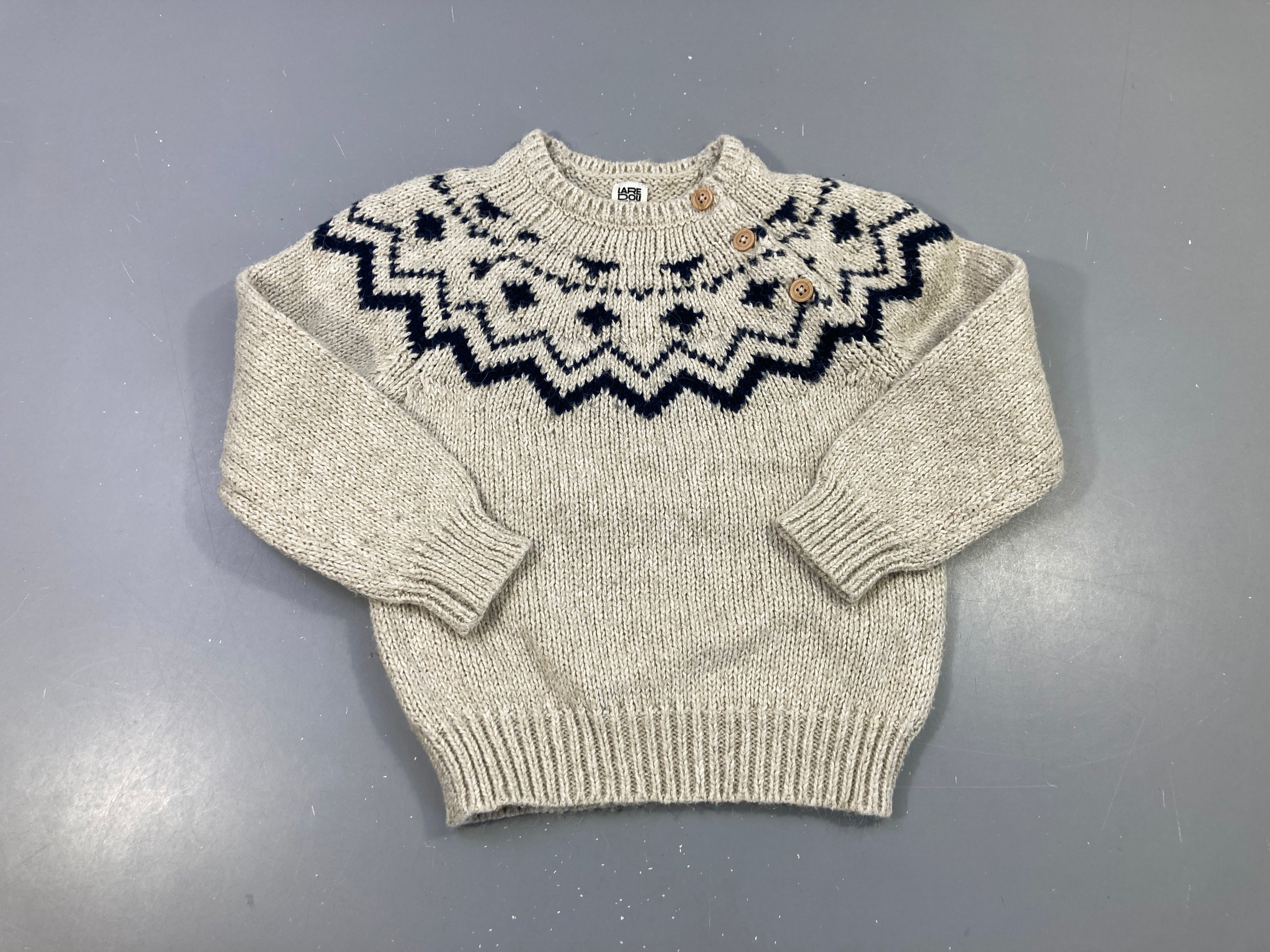 Pull beige motifs hiver bleu foncé
