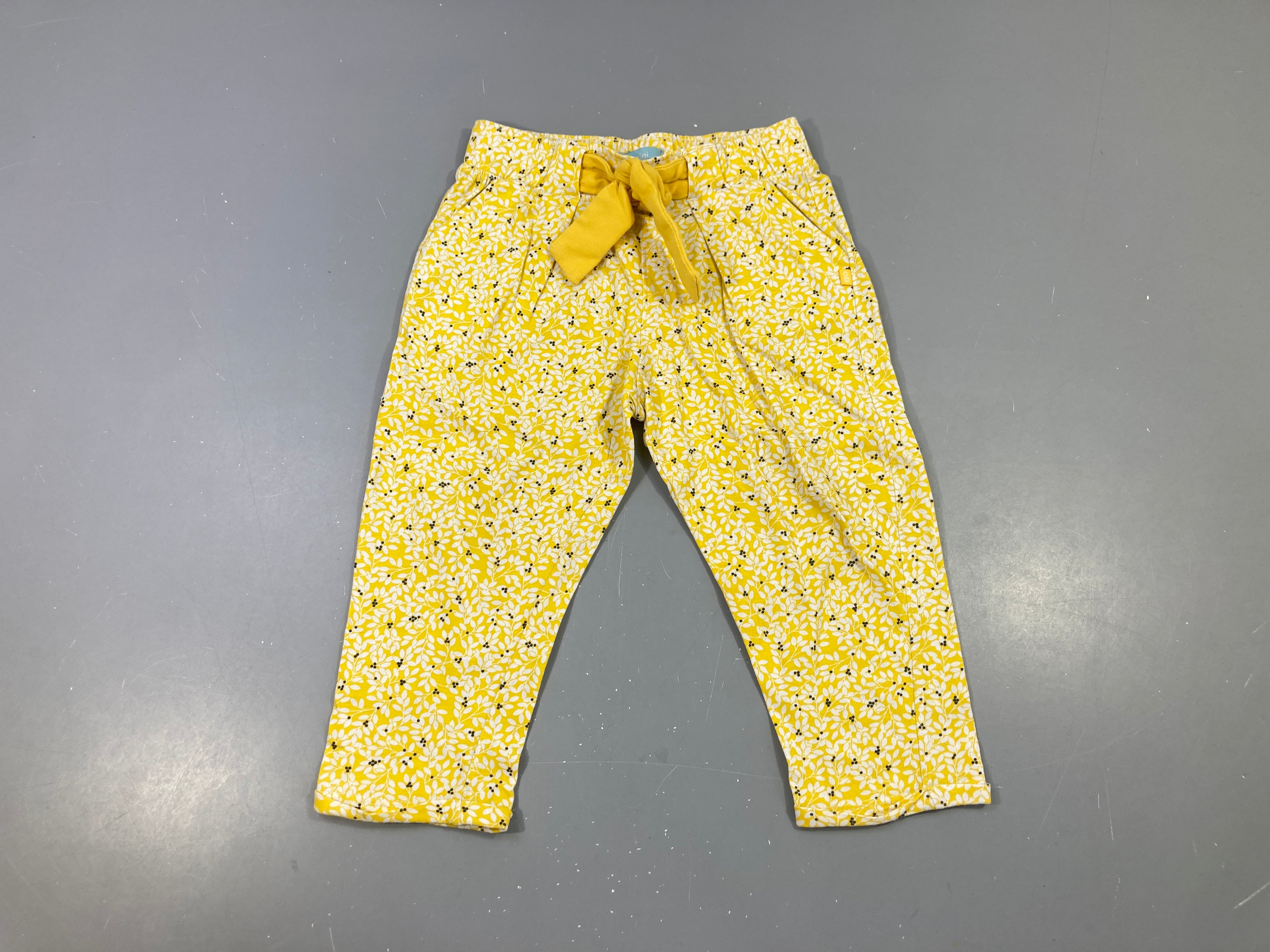 Pantalon jersey jaune feuillage noeud