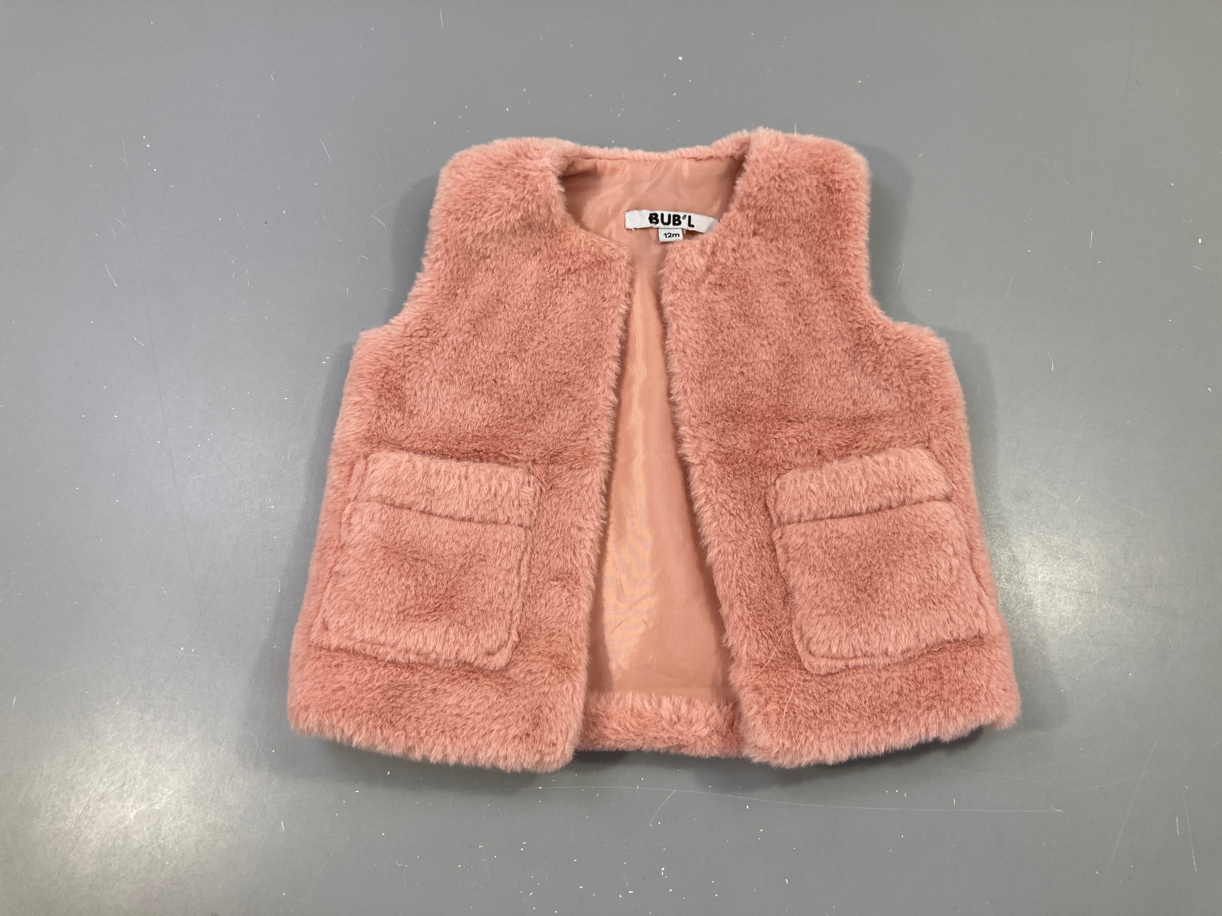 Gilet s.m fausse fourrure rose