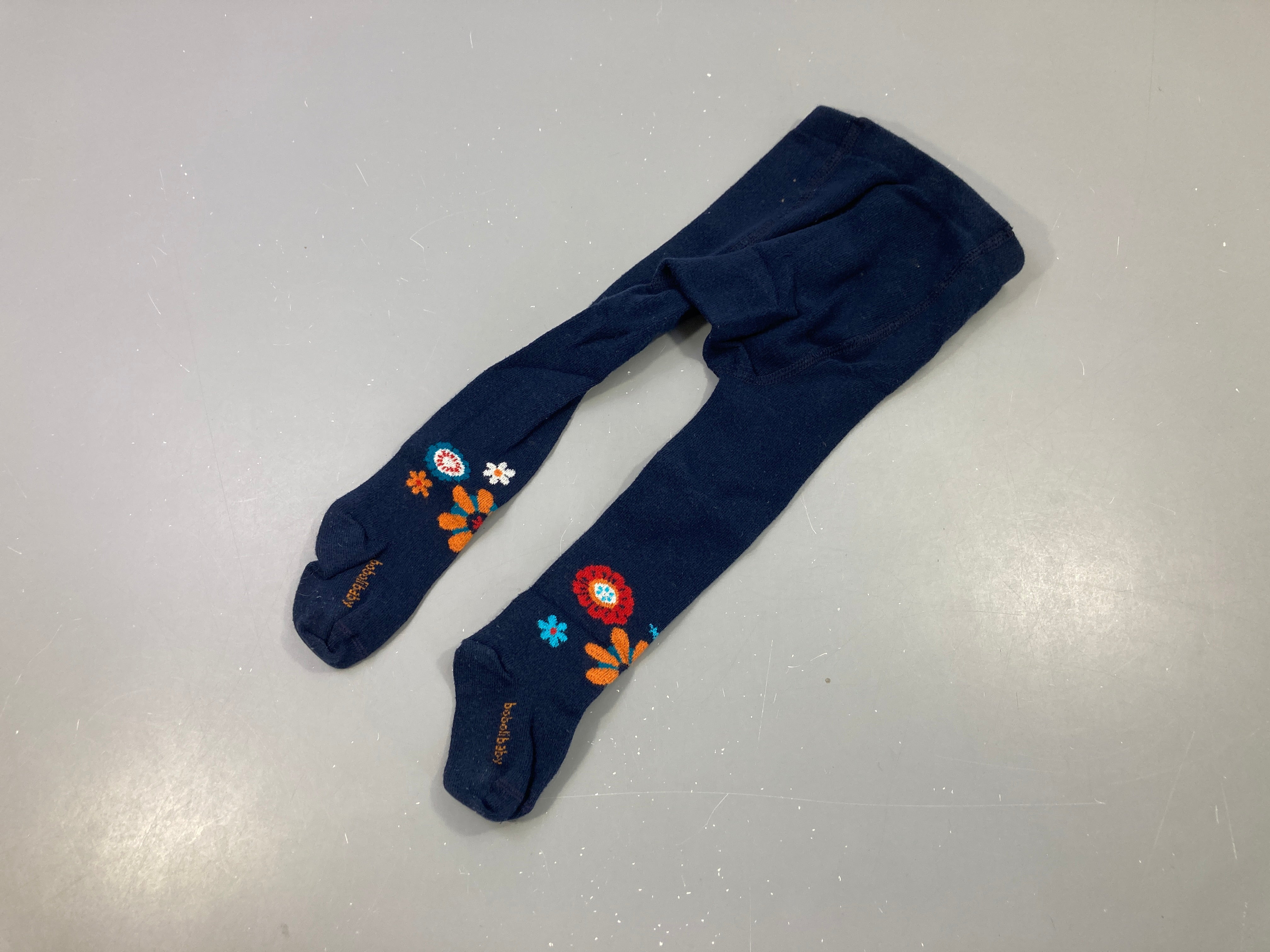 Collants bleu foncé fleurs