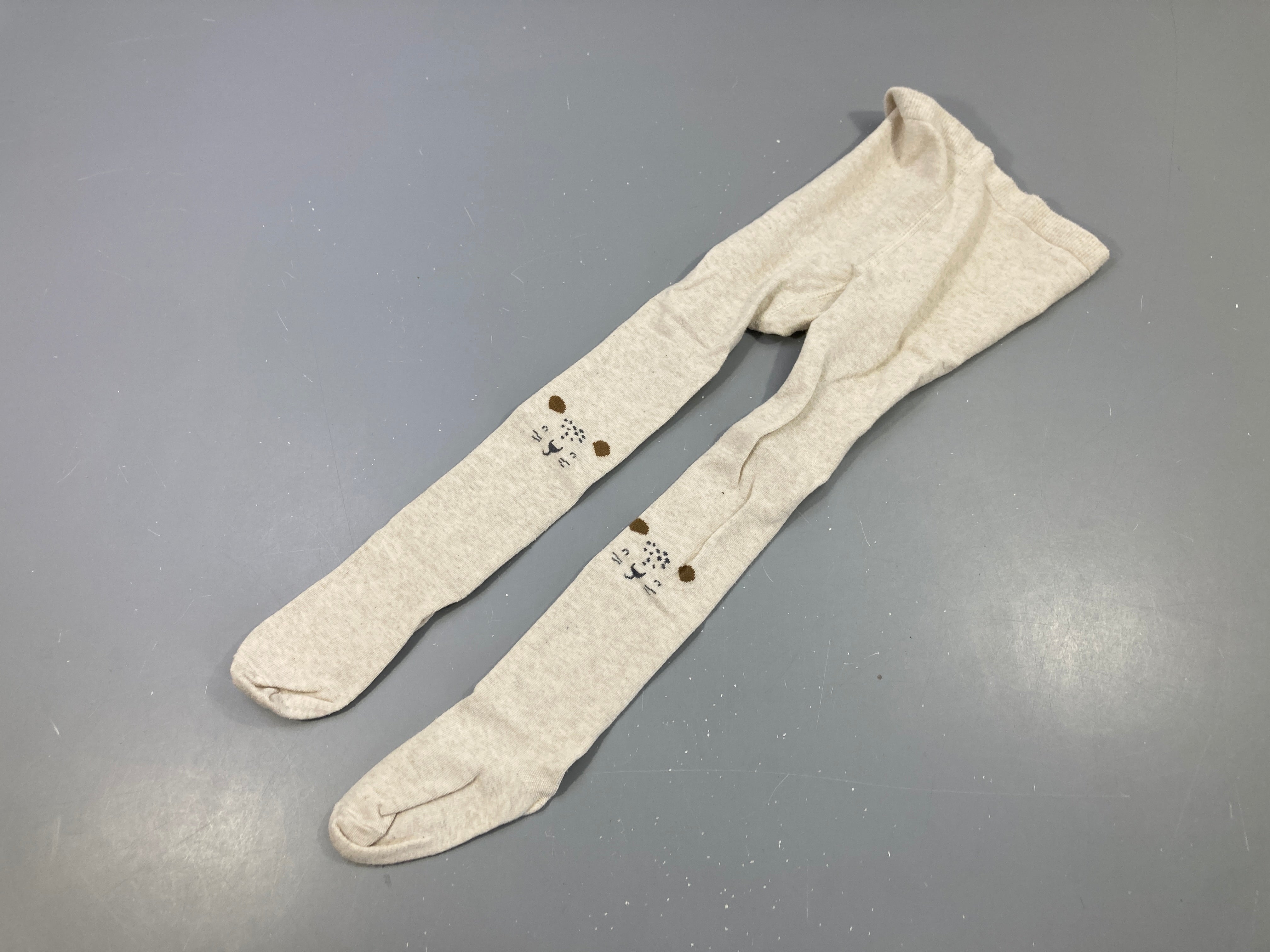 Collants beiges félins