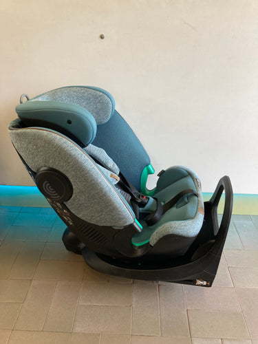 Siège auto évolutif Chicco Bi Seat i-Size Air Teal melange + Base 360° i-Size Légèrement bouloche fin assise., moins cher chez Petit Kiwi