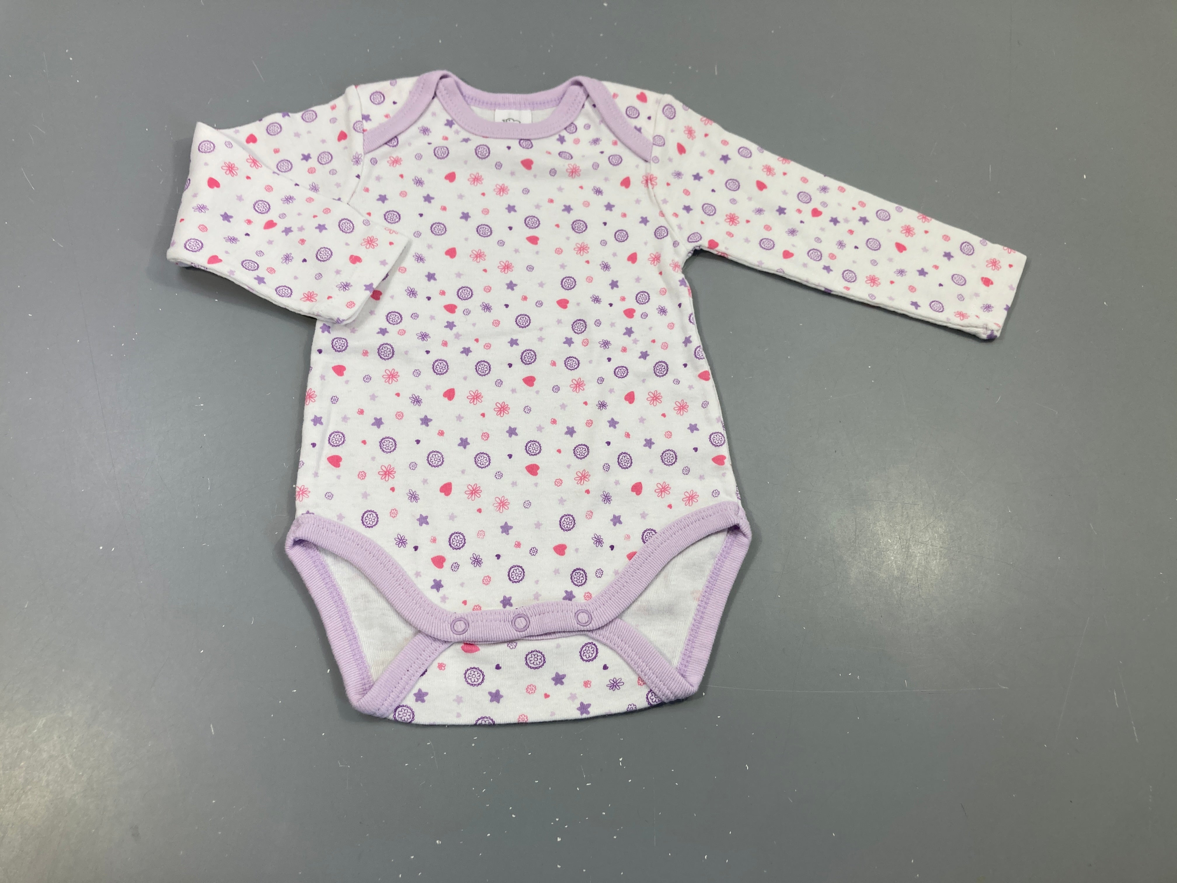 Body m.c blanc et mauve, motifs roses et mauves