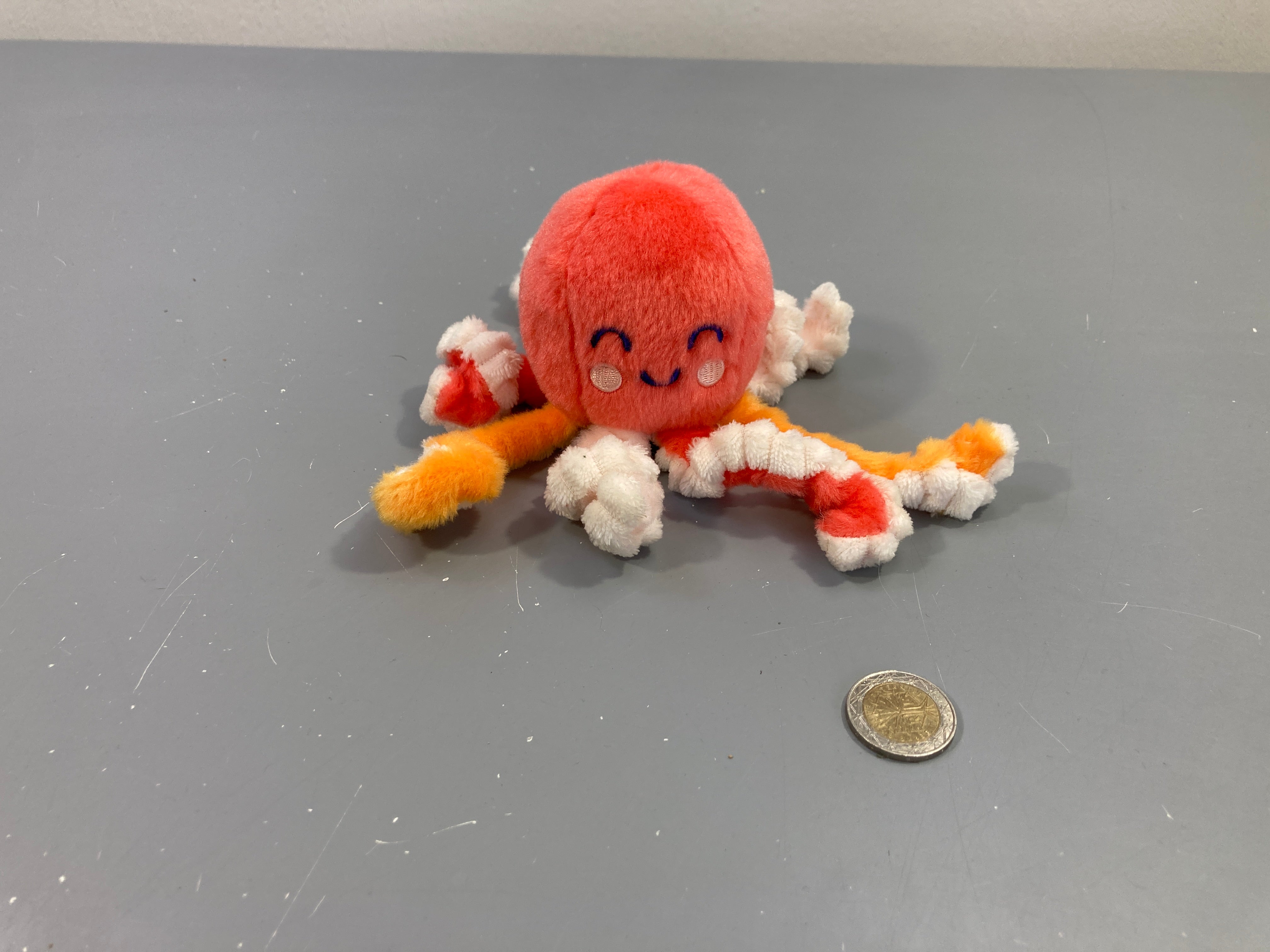 Petite peluche pieuvre corail/orange