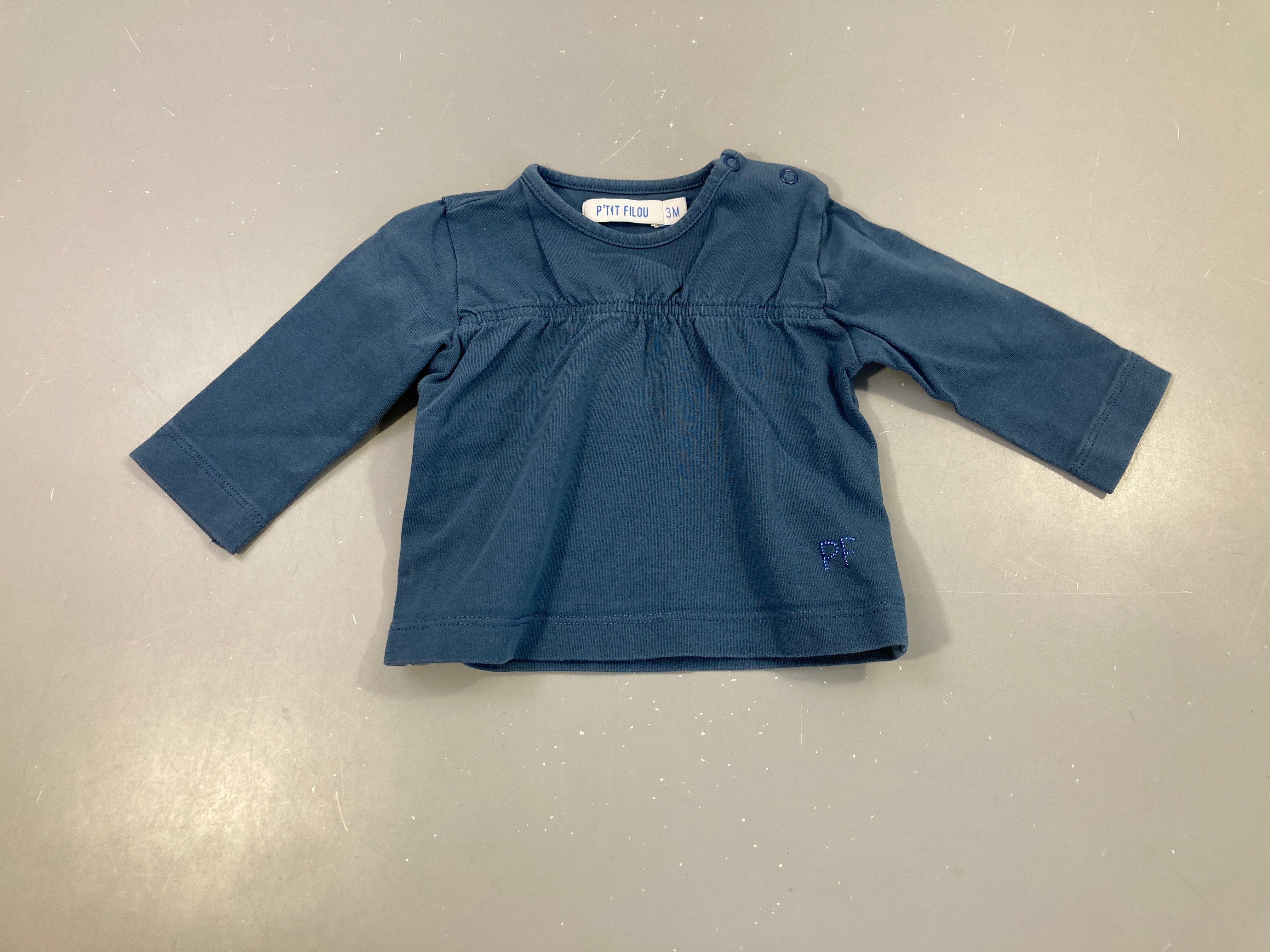 T-shirt m.l bleu légèrement délavé