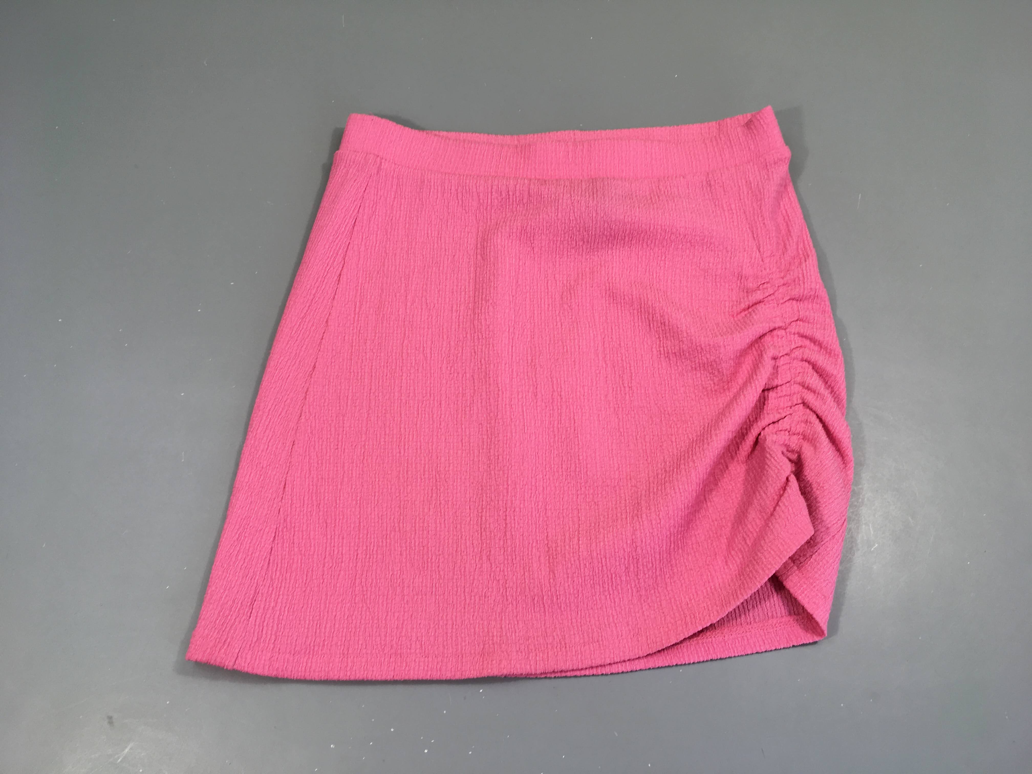Jupe texturée rose froncé coté