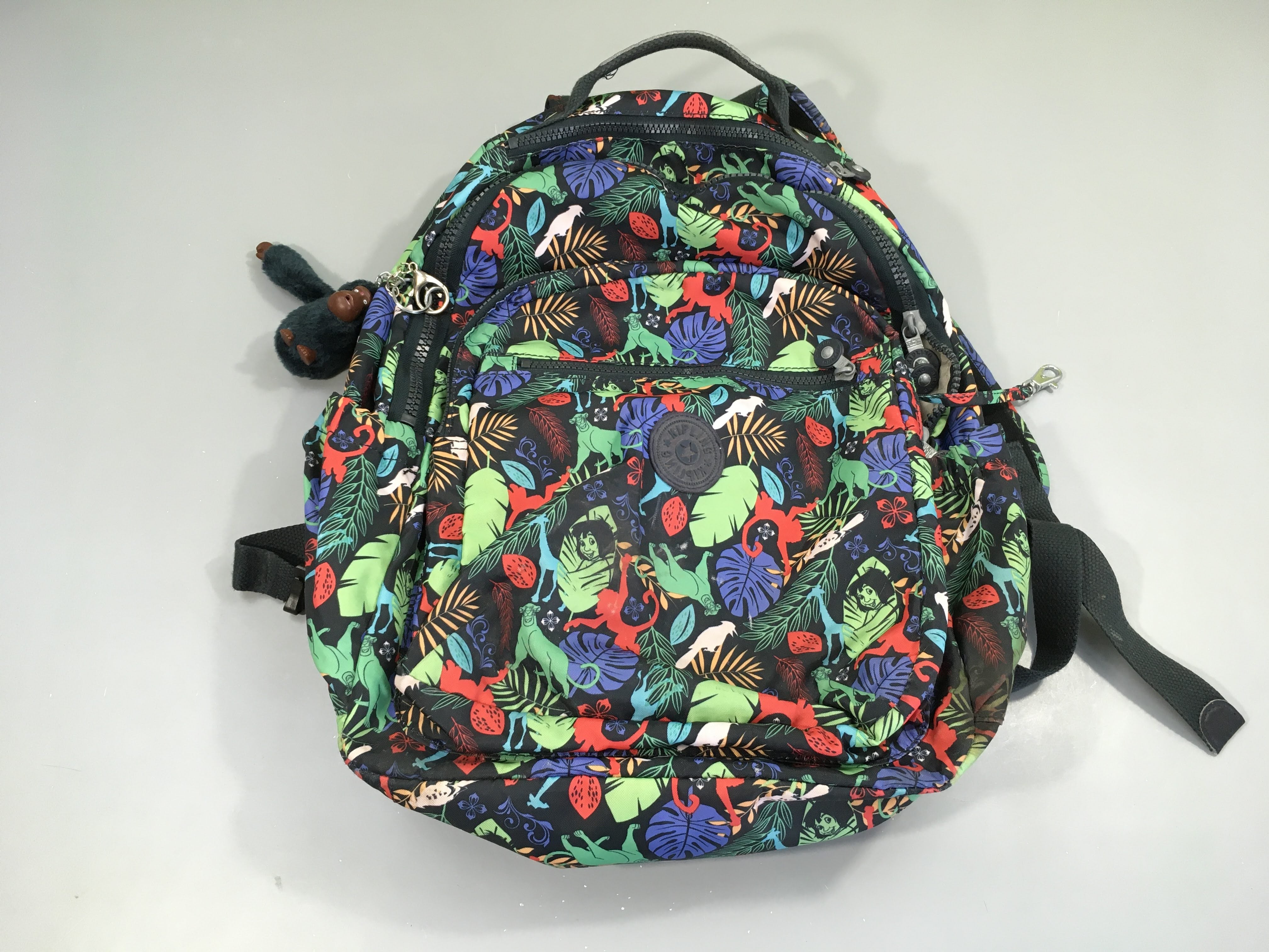 Sac à dos Livre de la Jungle Tache fong gauche fondur dans le décor Bon état
