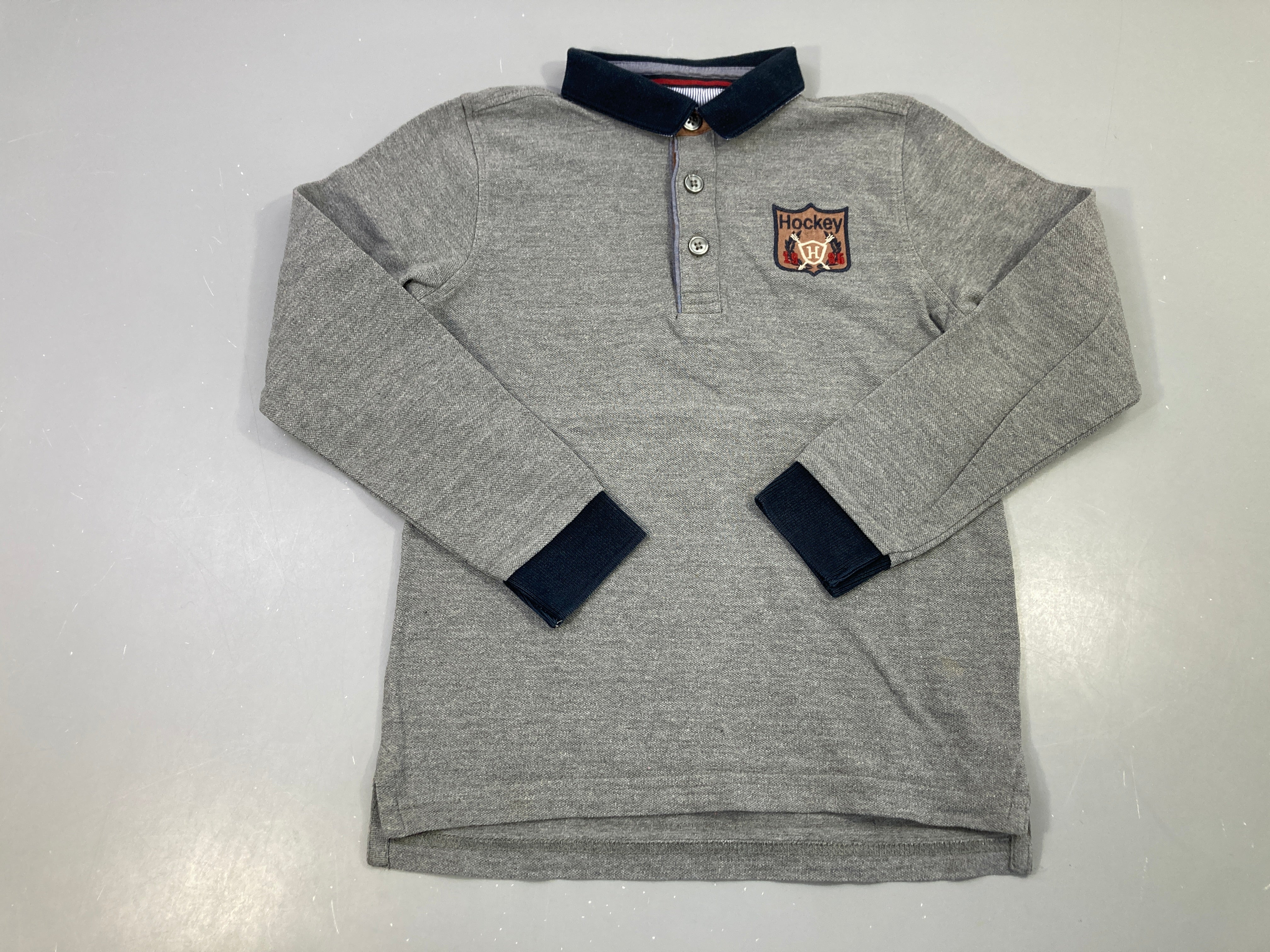 Polo ml gris Hockey légèrement bouloché