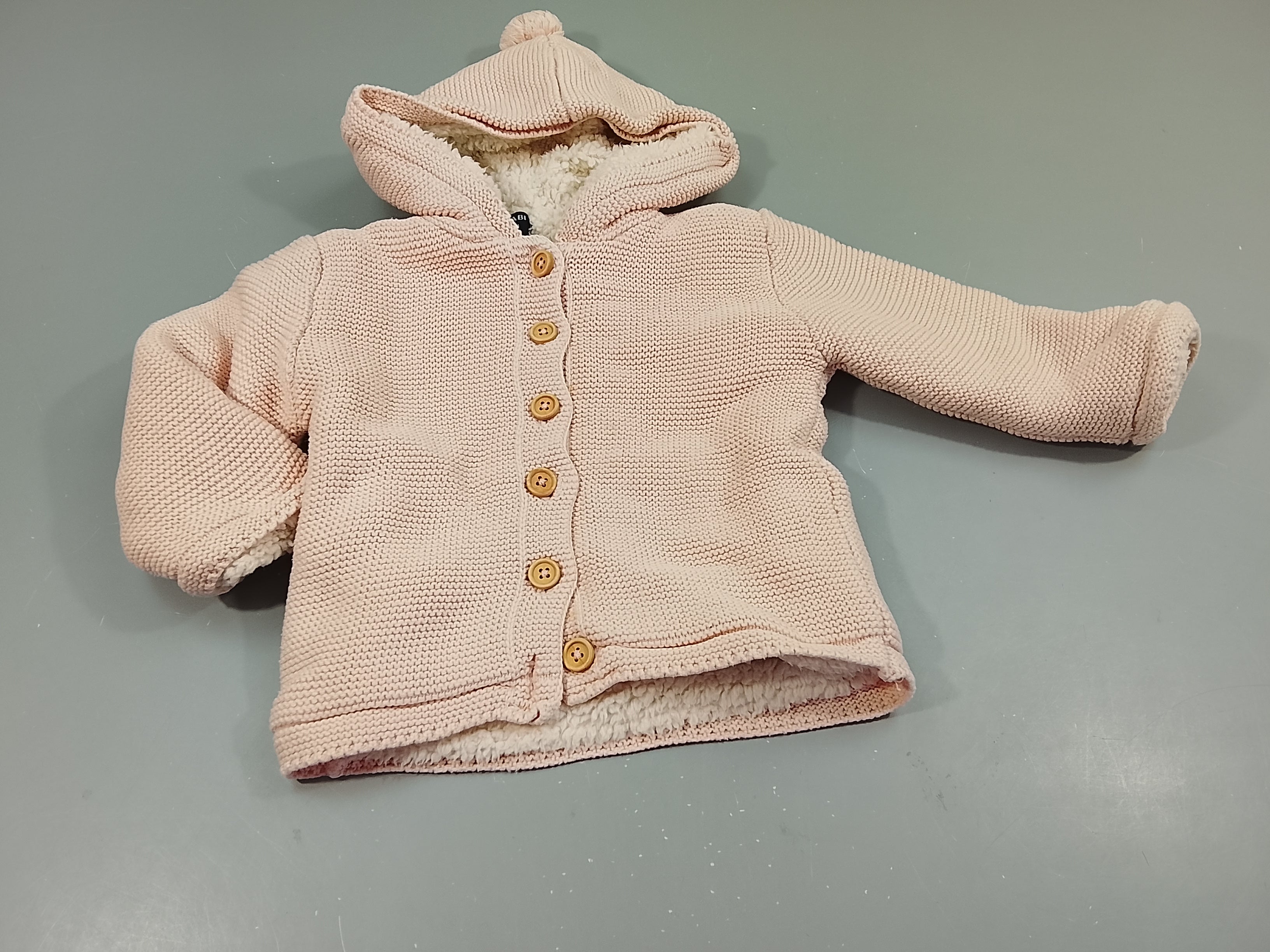 Gilet tricot rose à capuche pompon,intérieur moutonné