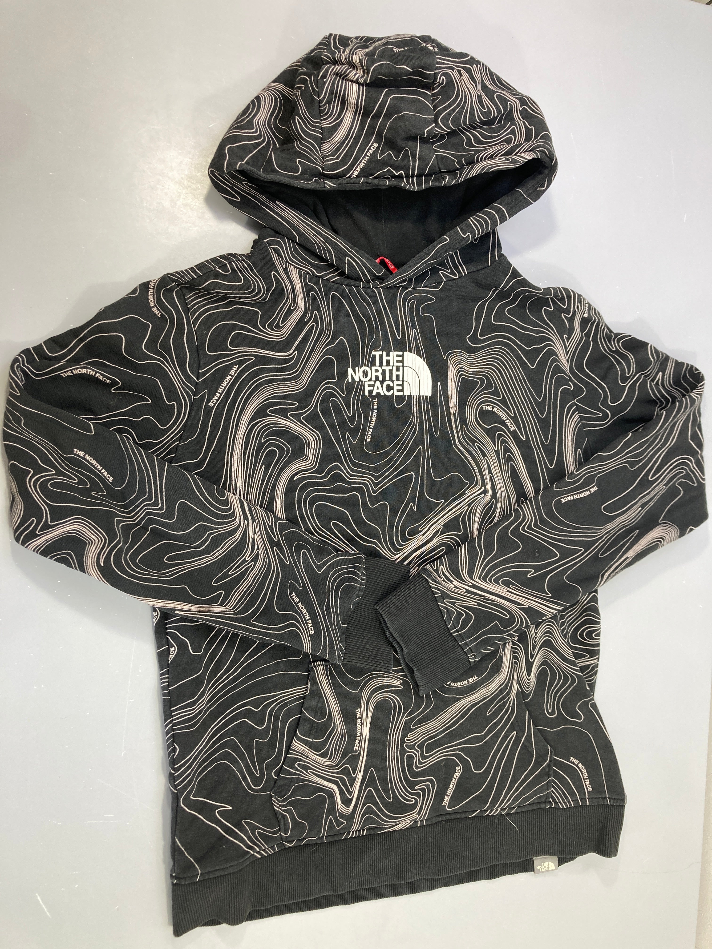 Sweat à capuche noir motifs blancs The North Face