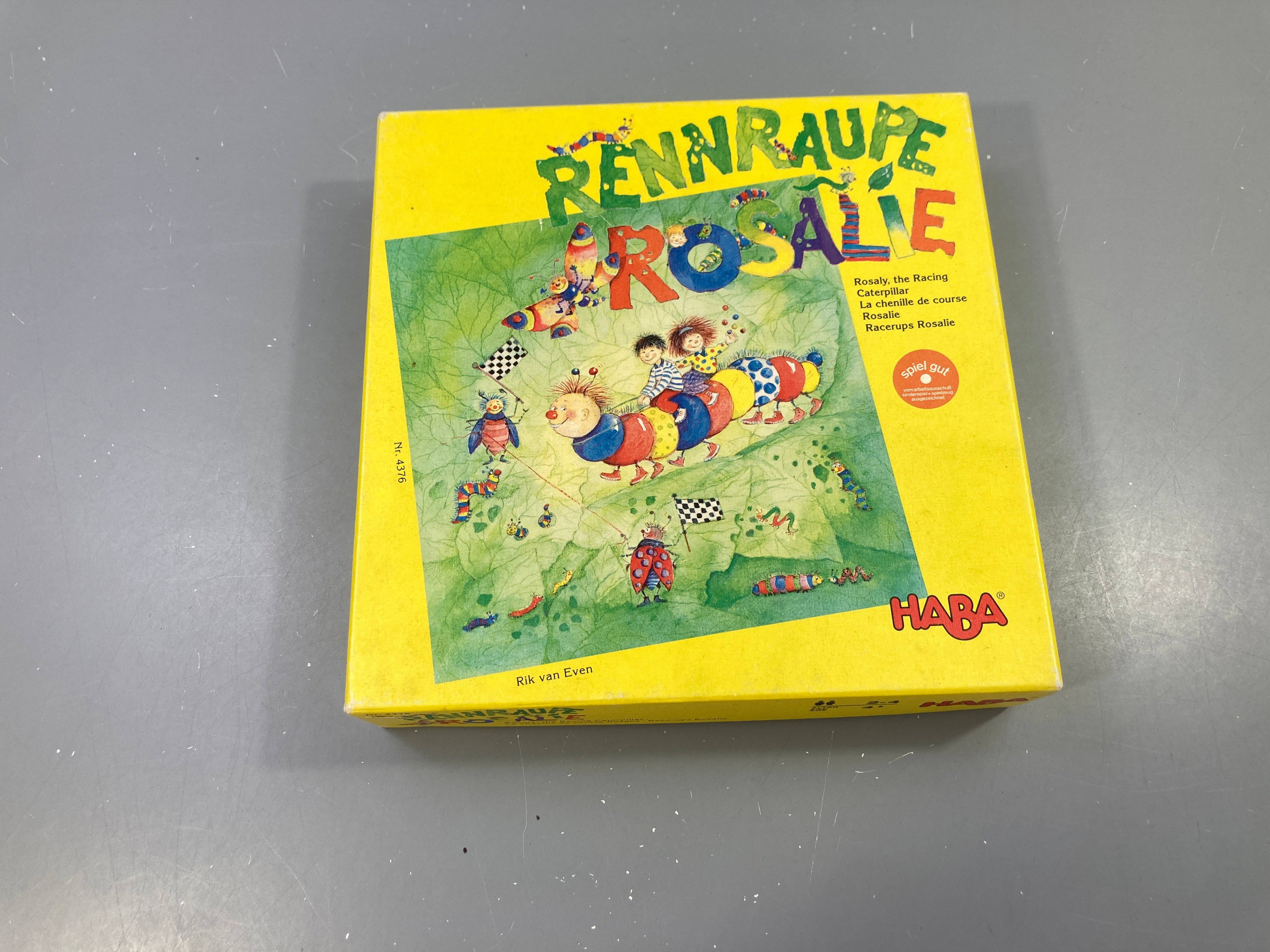 Rennraupe Rosalie/Rosalie la chenille de course Complet mais plateau légèrement corné bas et notice (en français) un peu tachée.