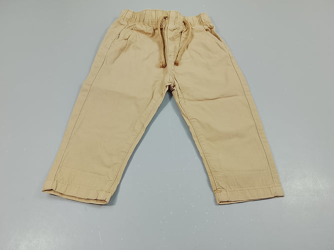 Pantalon en toile beige, taille élastique, moins cher chez Petit Kiwi