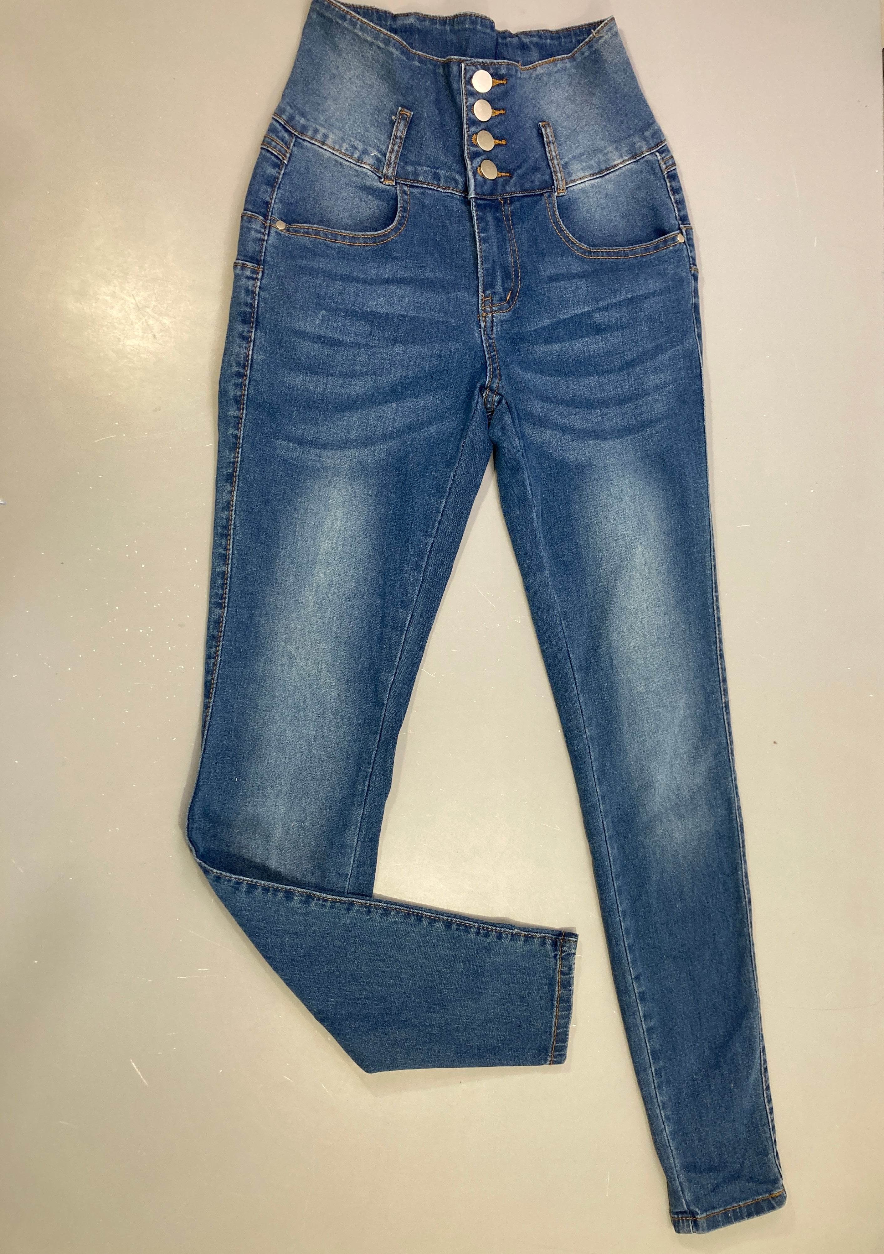 Jean taille haute boutonné effet superposé tressé arrière