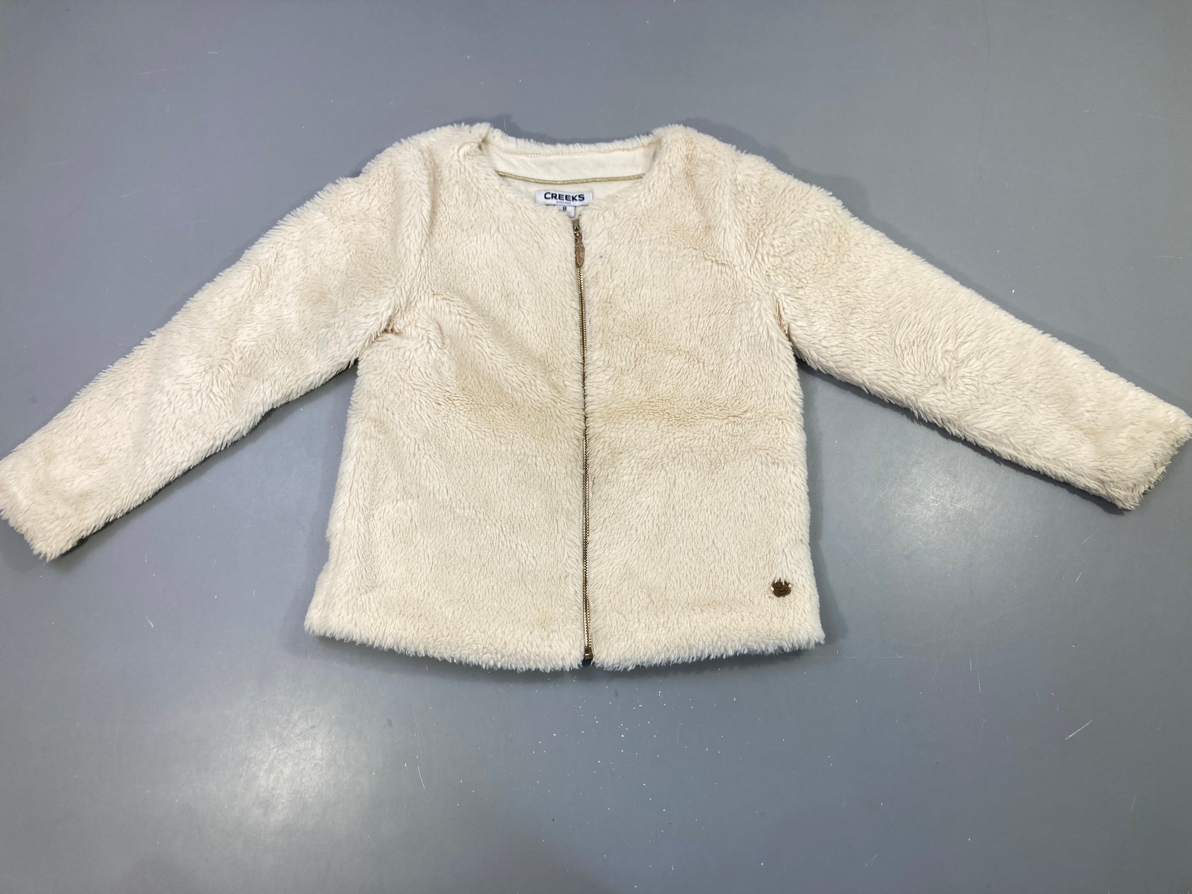 Gilet Creeks peluche écru, zip doré avec ornement feuille
