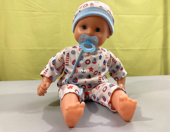 Poupée Peterkin avec tutute pyjama motifs mer, à relaver, moins cher chez Petit Kiwi