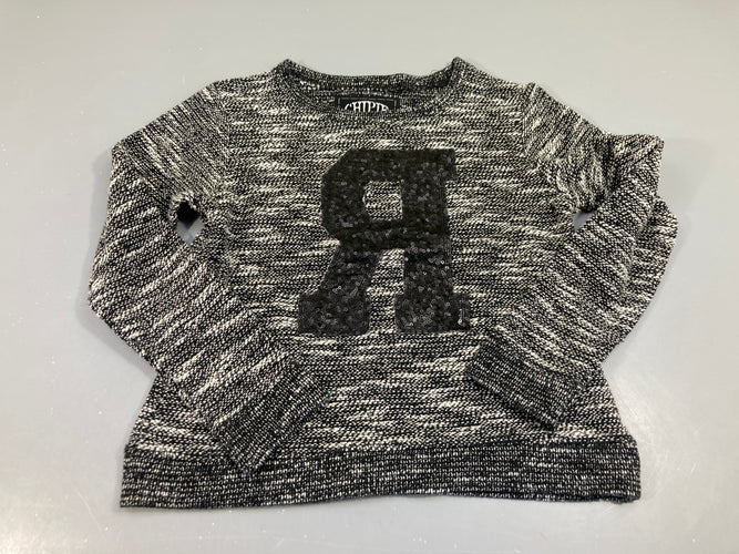 Pull noir et blanc chiné , lettre sequin, moins cher chez Petit Kiwi