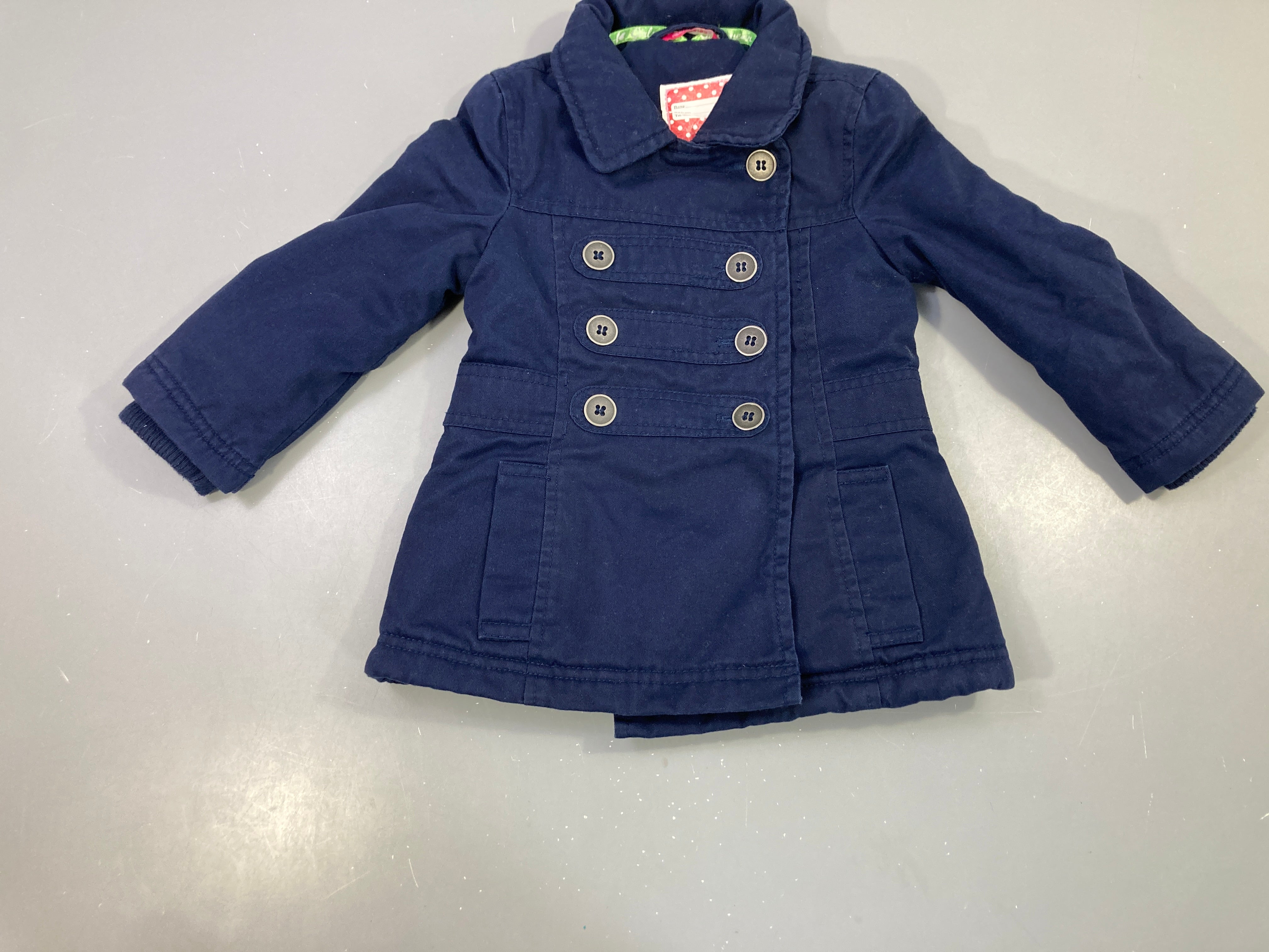 Manteau ouatiné bleu marine boutonné
