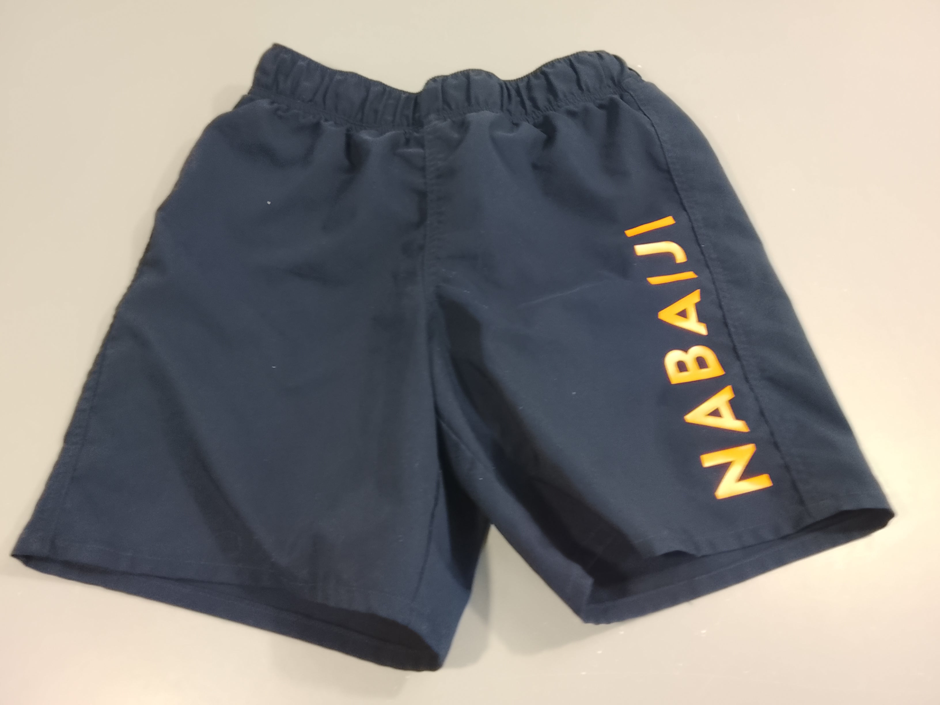 Maillot short bleu marine inscription  Nabaiji orange