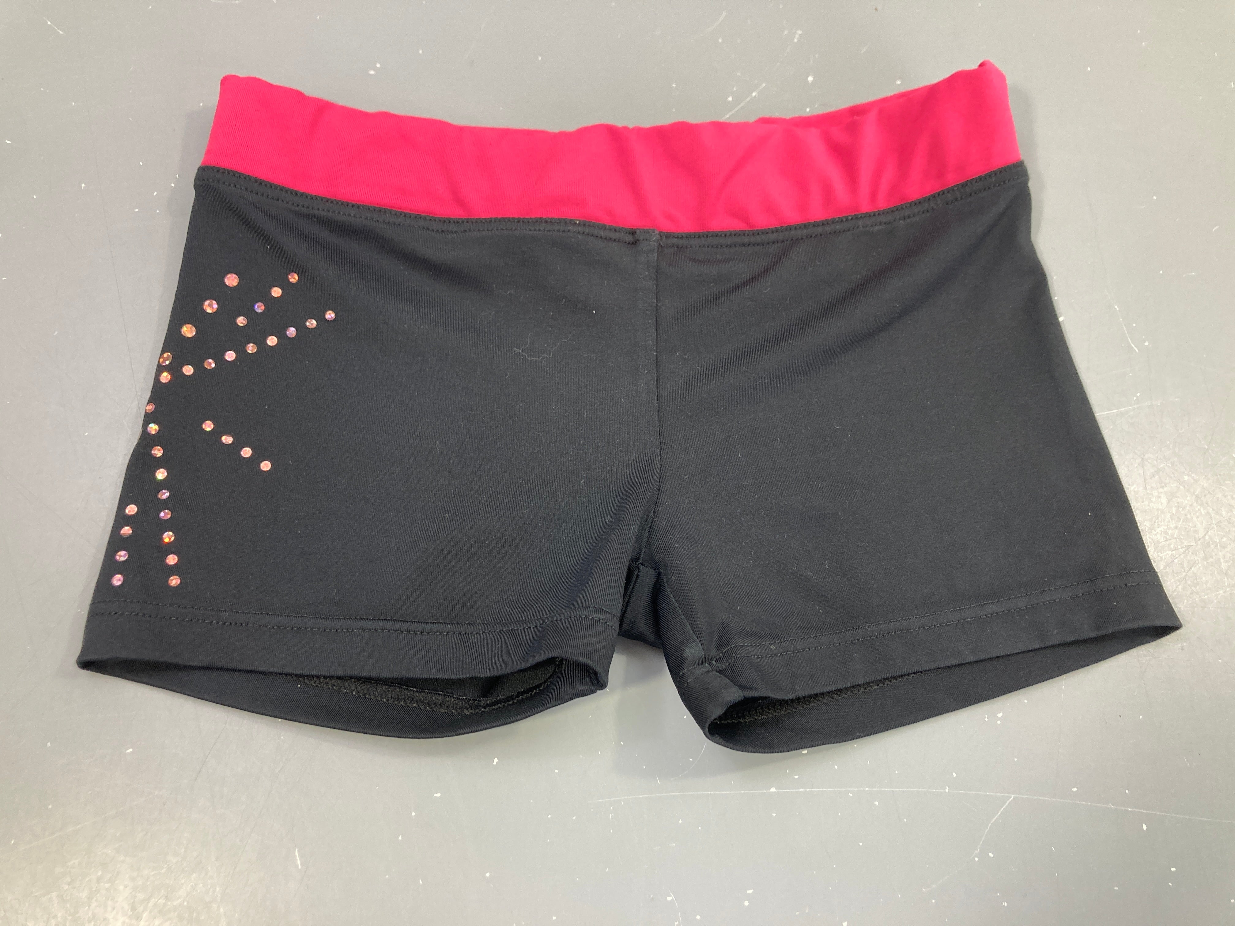 Short de gym  noir et rose avec strass, pas de taille indiquée, estimée 4a