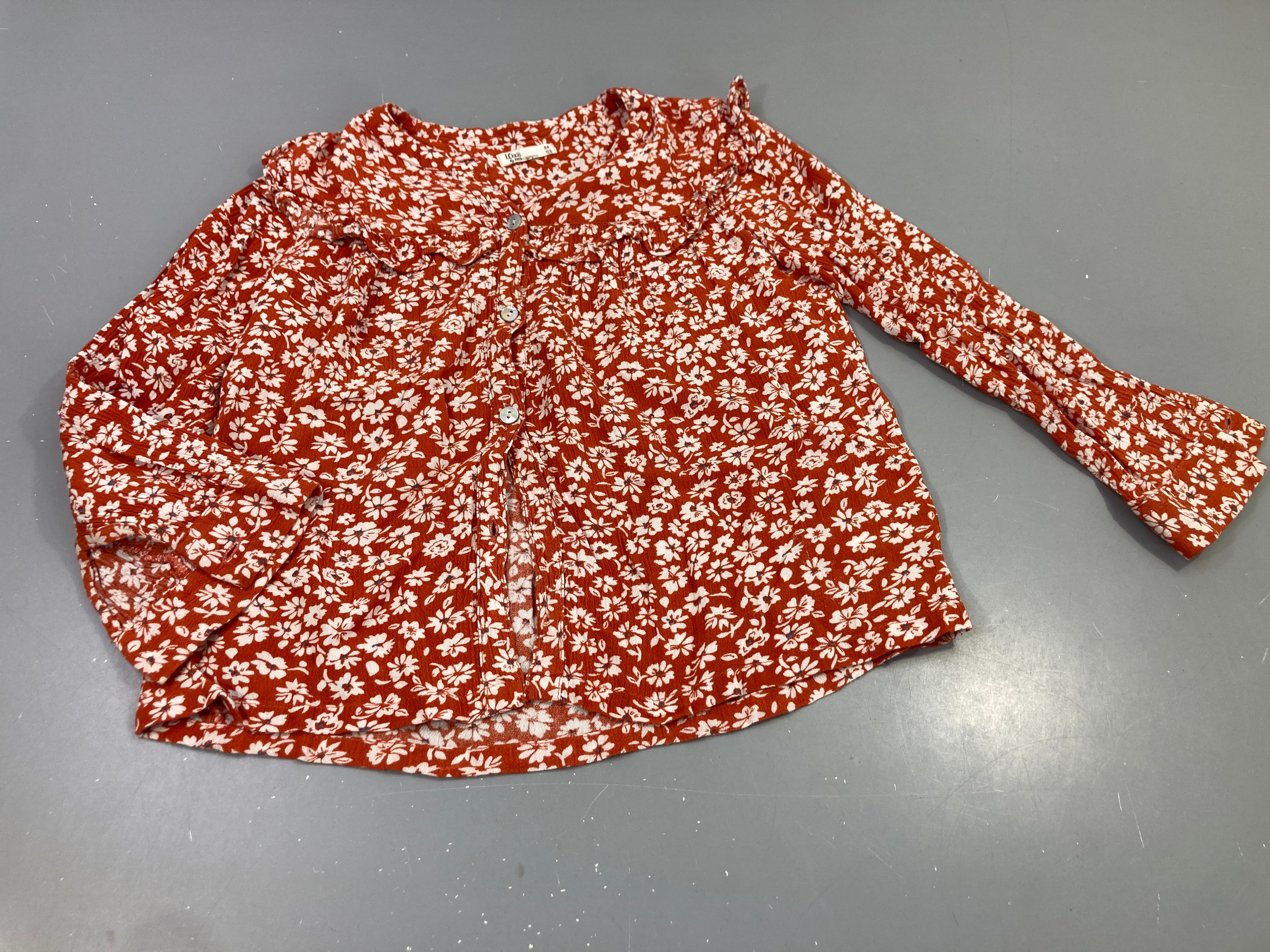 Blouse ml Little Cigogne rouille à fleurs blanches