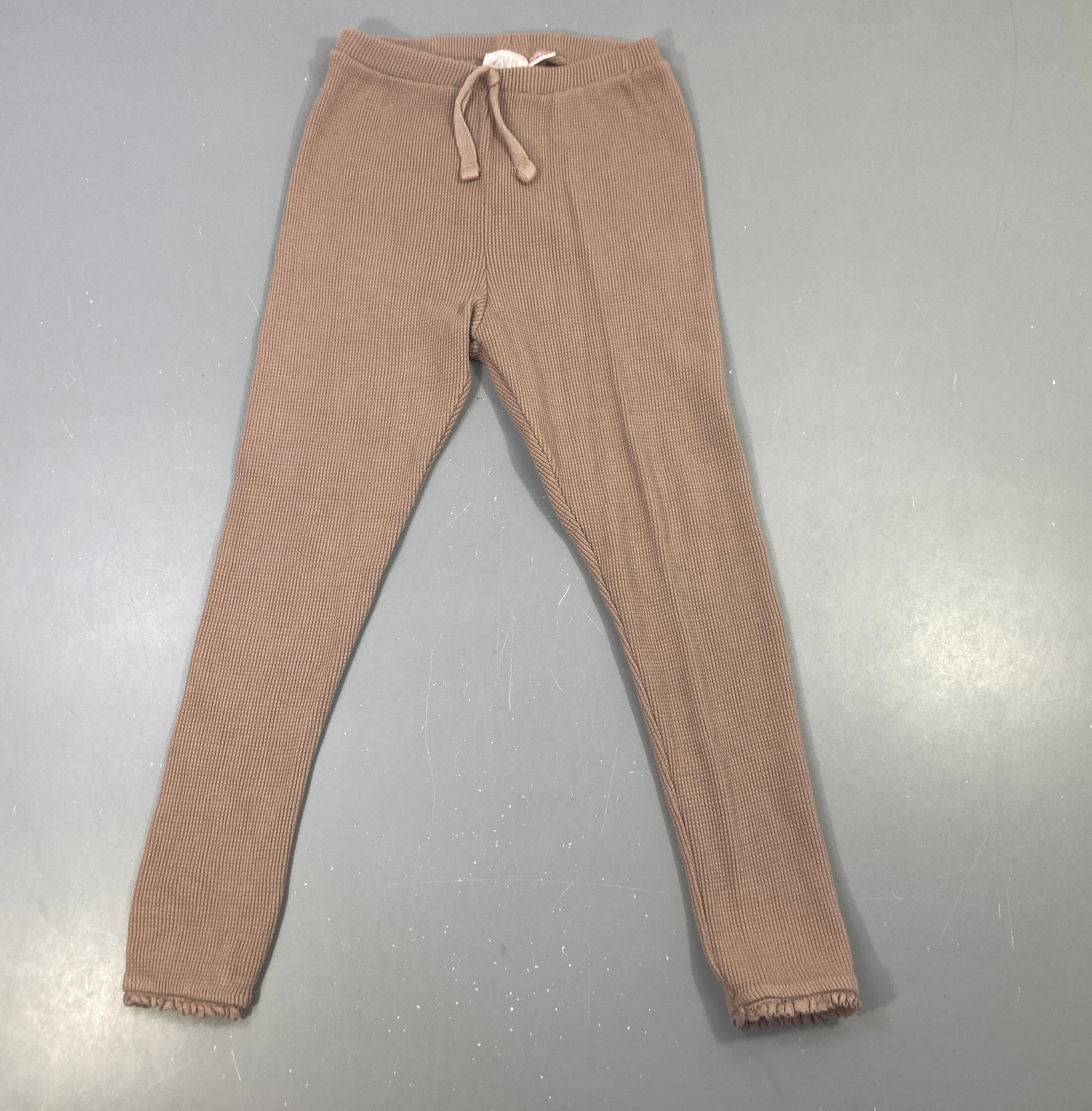 Pantalon jersey texturé brun dentelle dans le bas