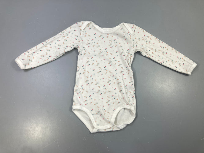 Body m.l blanc fleuri, légèrement bouloché, moins cher chez Petit Kiwi