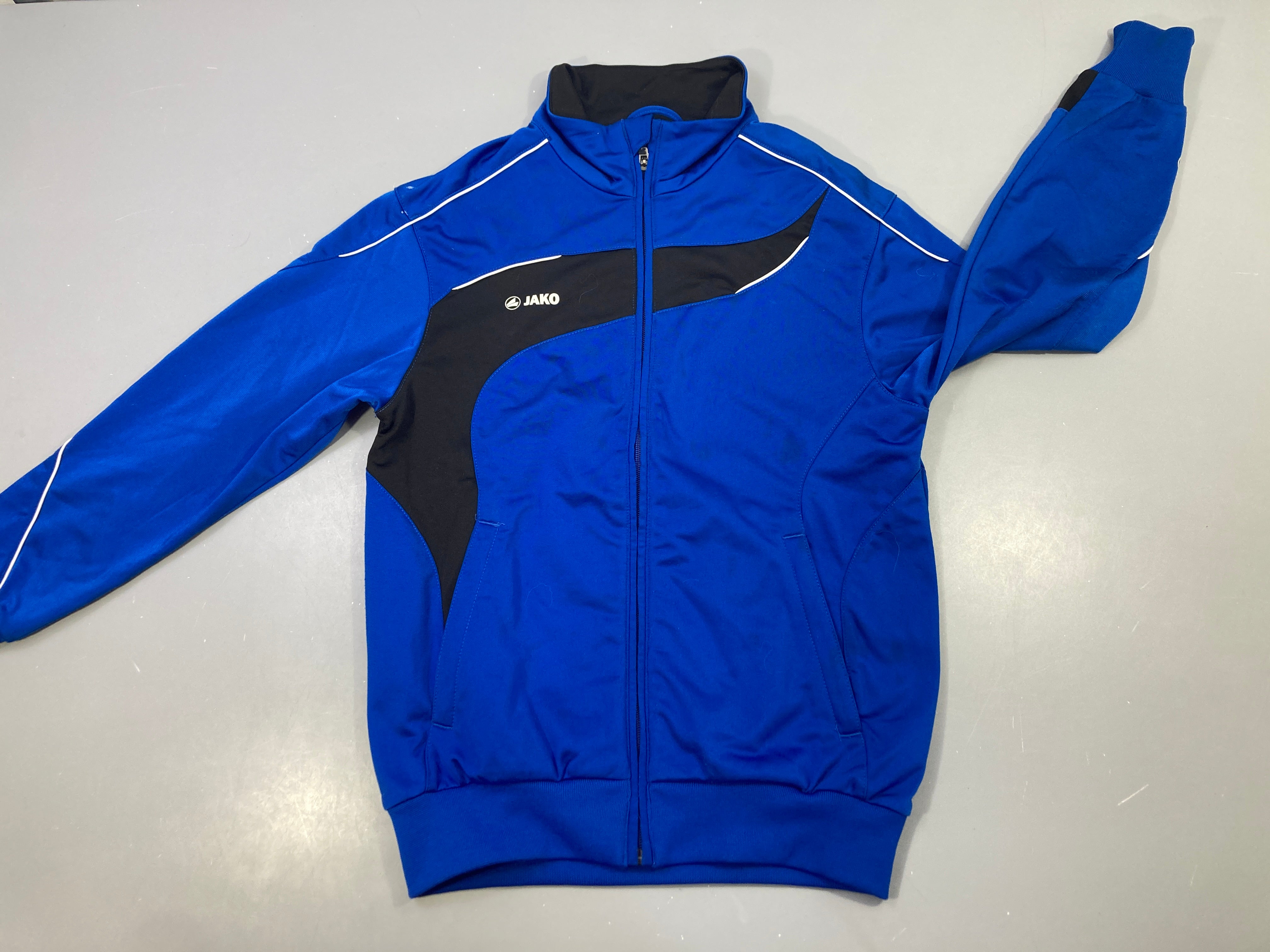 Gilet zippé survetement sport bleu/noir jako, légèrement bouloché