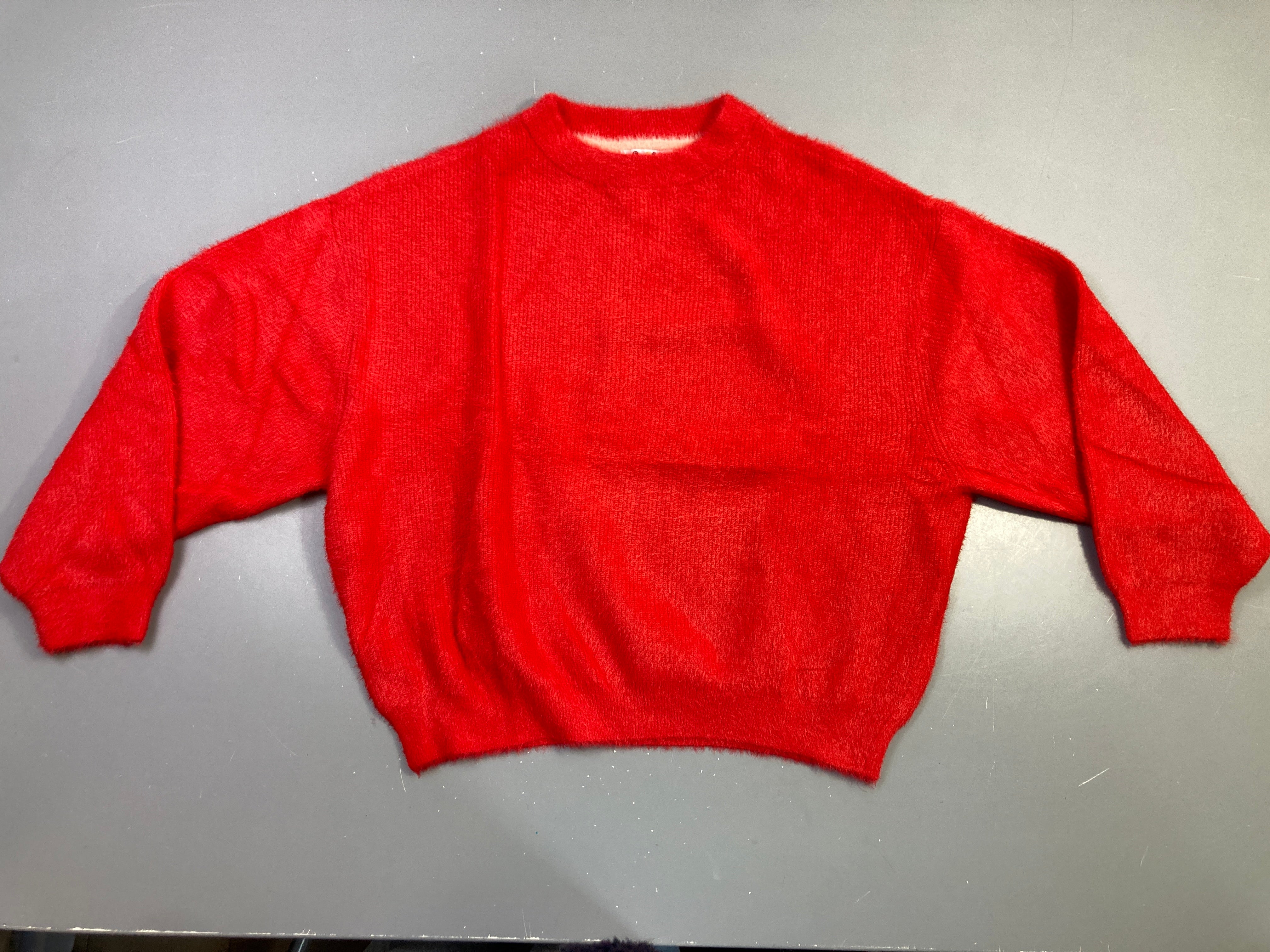 Pull rouge duveteux