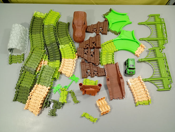 Circuit voiture dinosaure, moins cher chez Petit Kiwi
