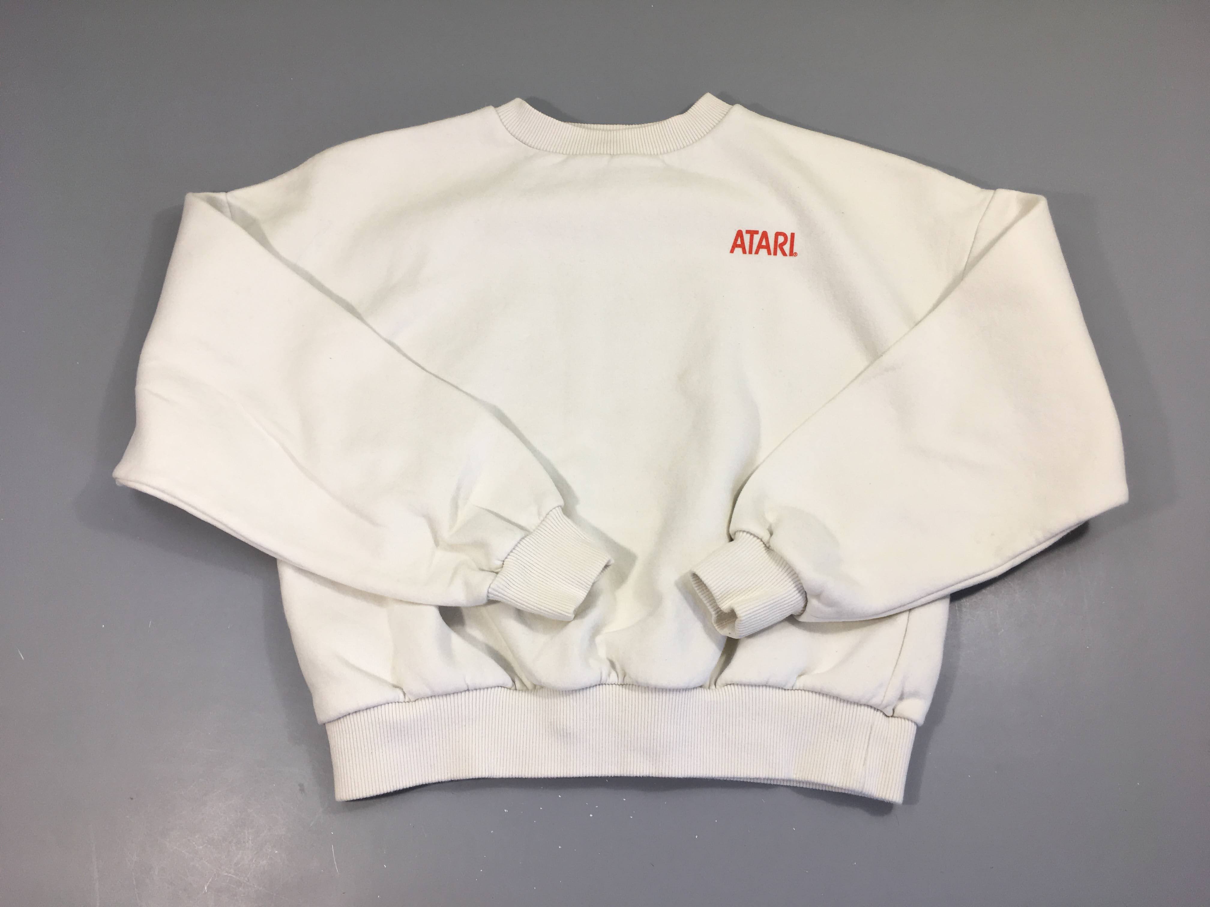 Sweat blanc Atari, légèrement bouloché