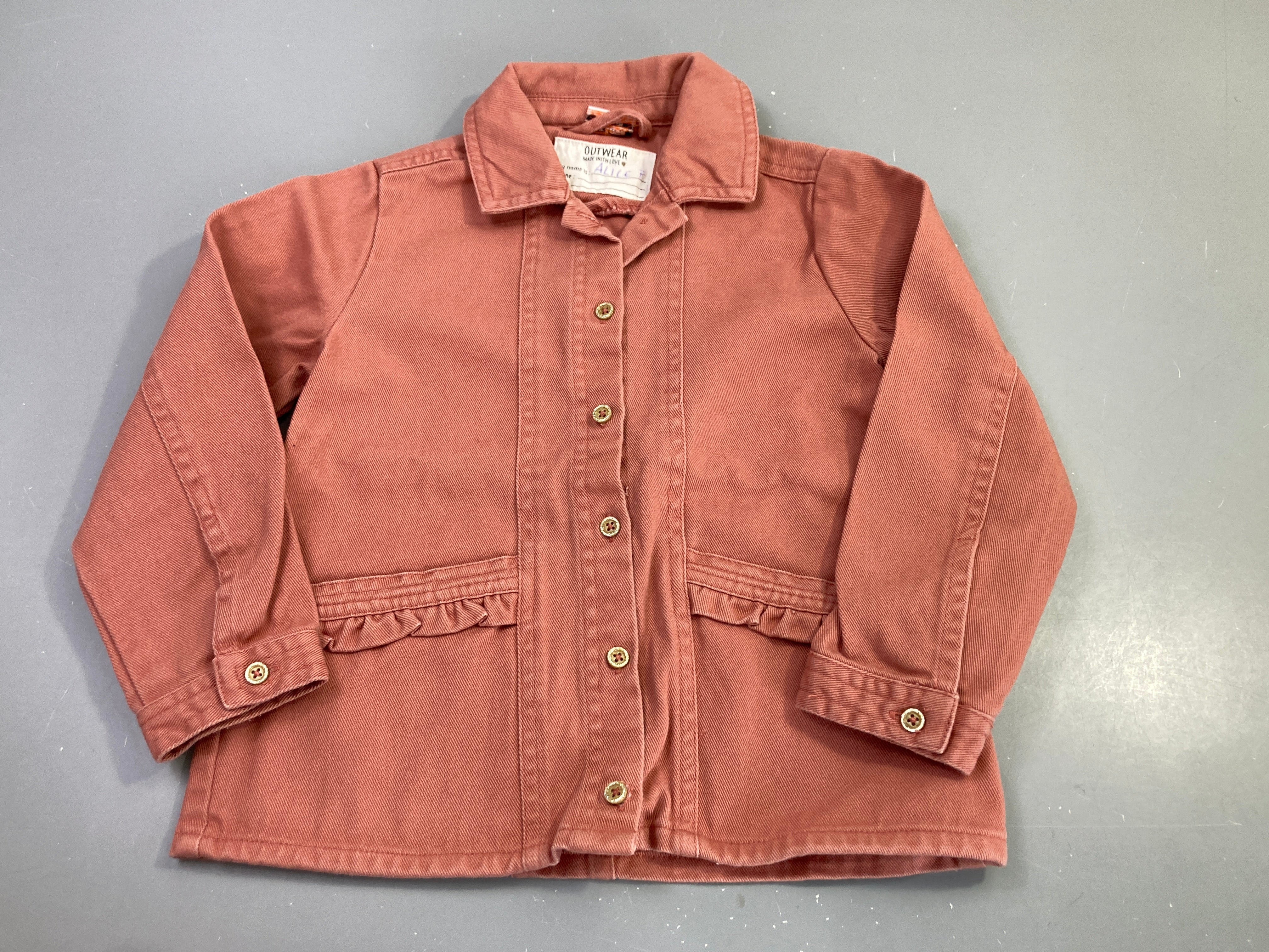 Veste toile boutonnée rose volant