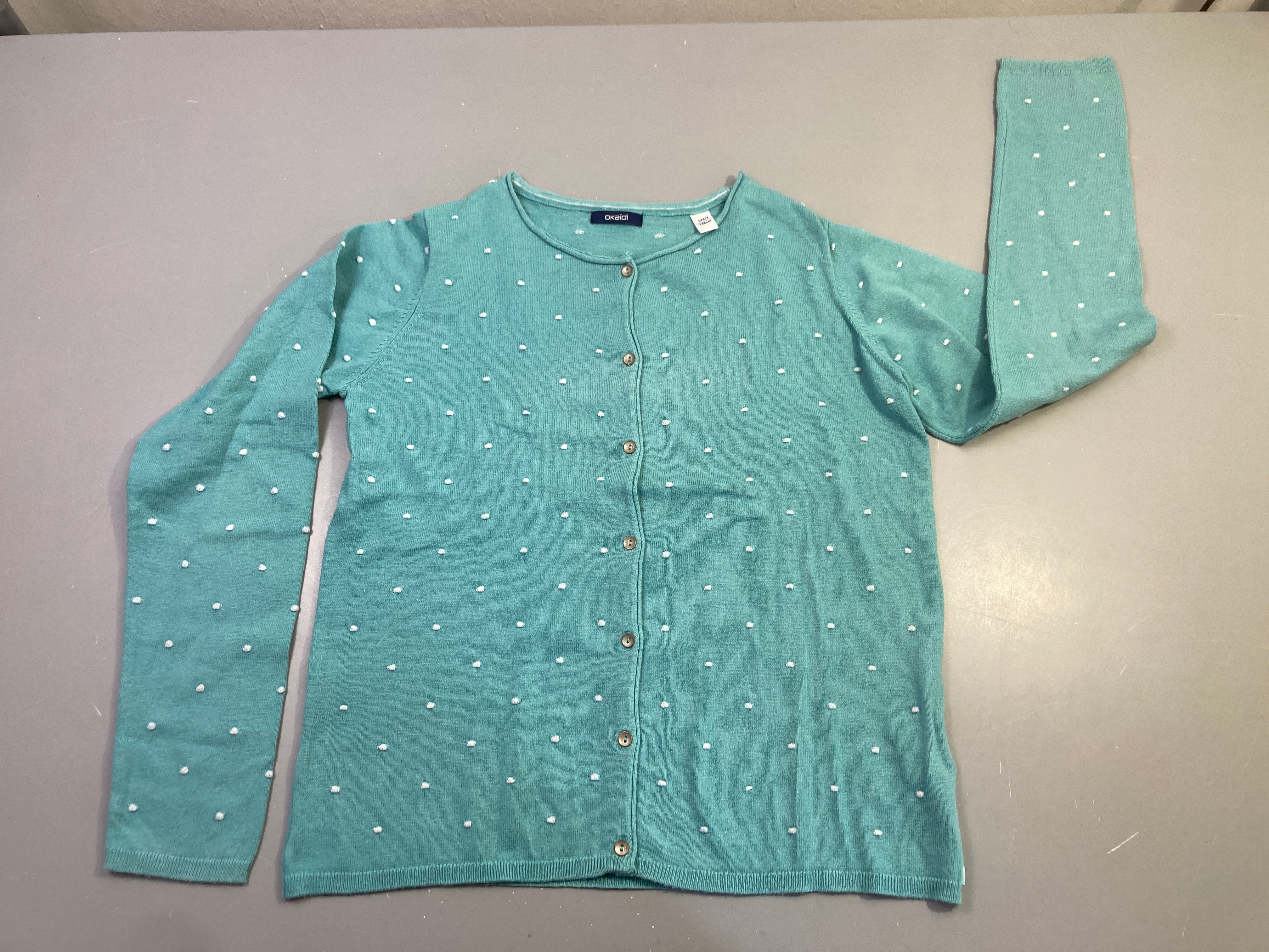Gilet turquoise pois blancc texturé Légèrement bouloché