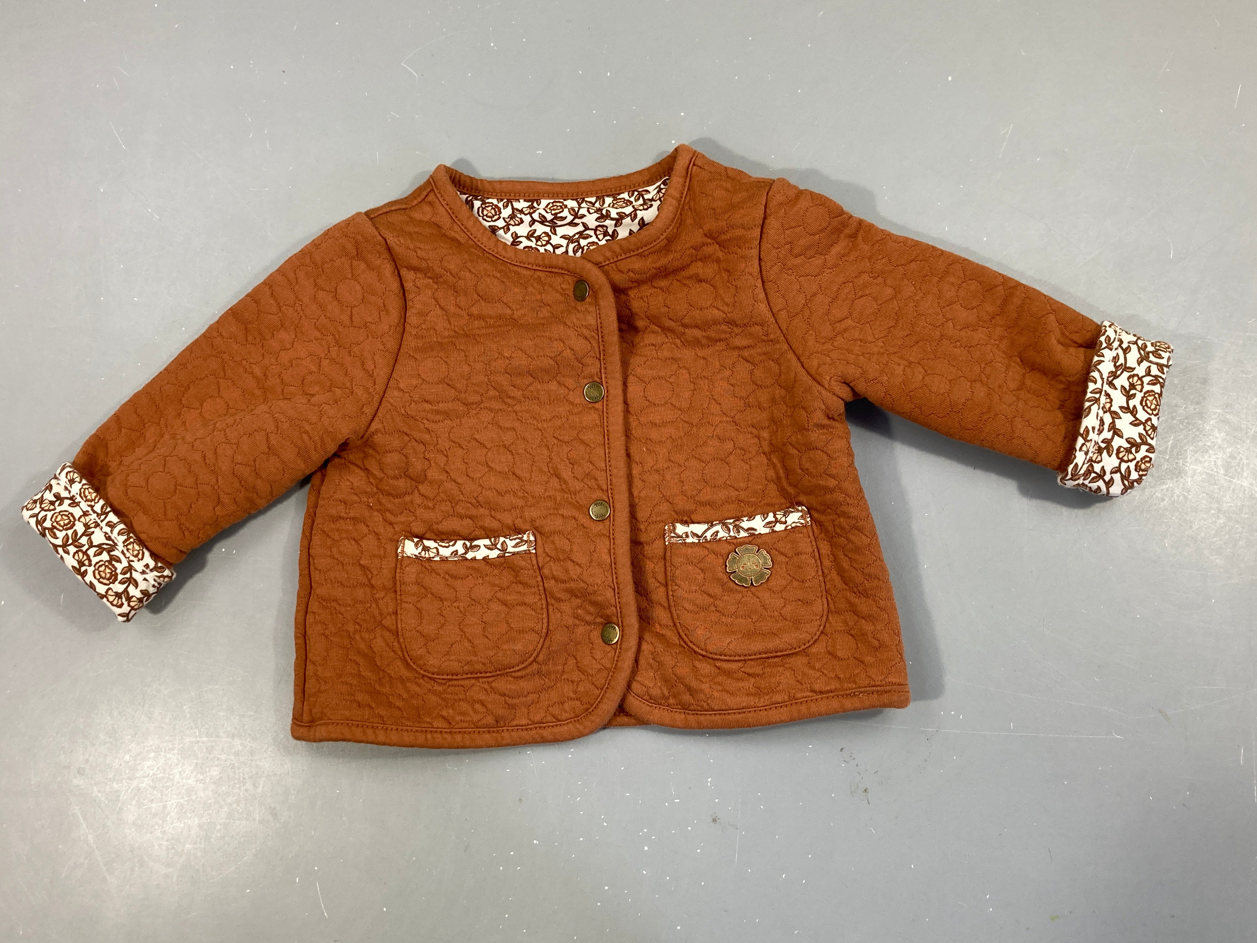 Gilet à pression réversible molleton brun fleurs