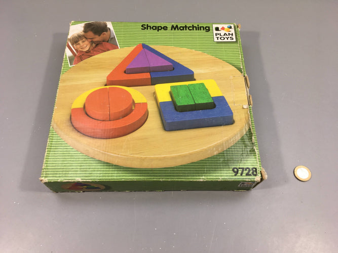 Puzzle à formes géométriques, Plan Toys, moins cher chez Petit Kiwi