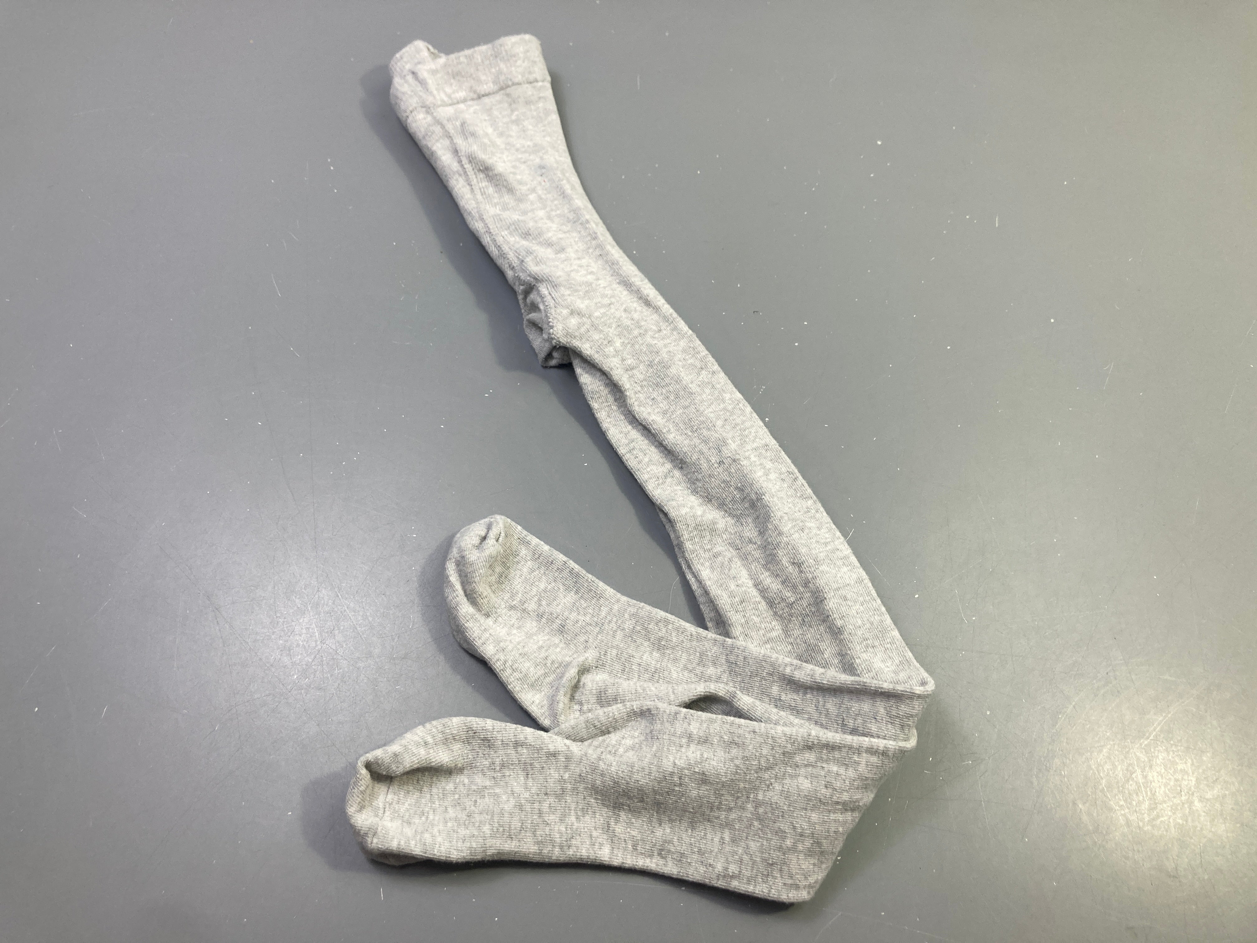 Collants gris  clair chiné , très légèrement bouloché