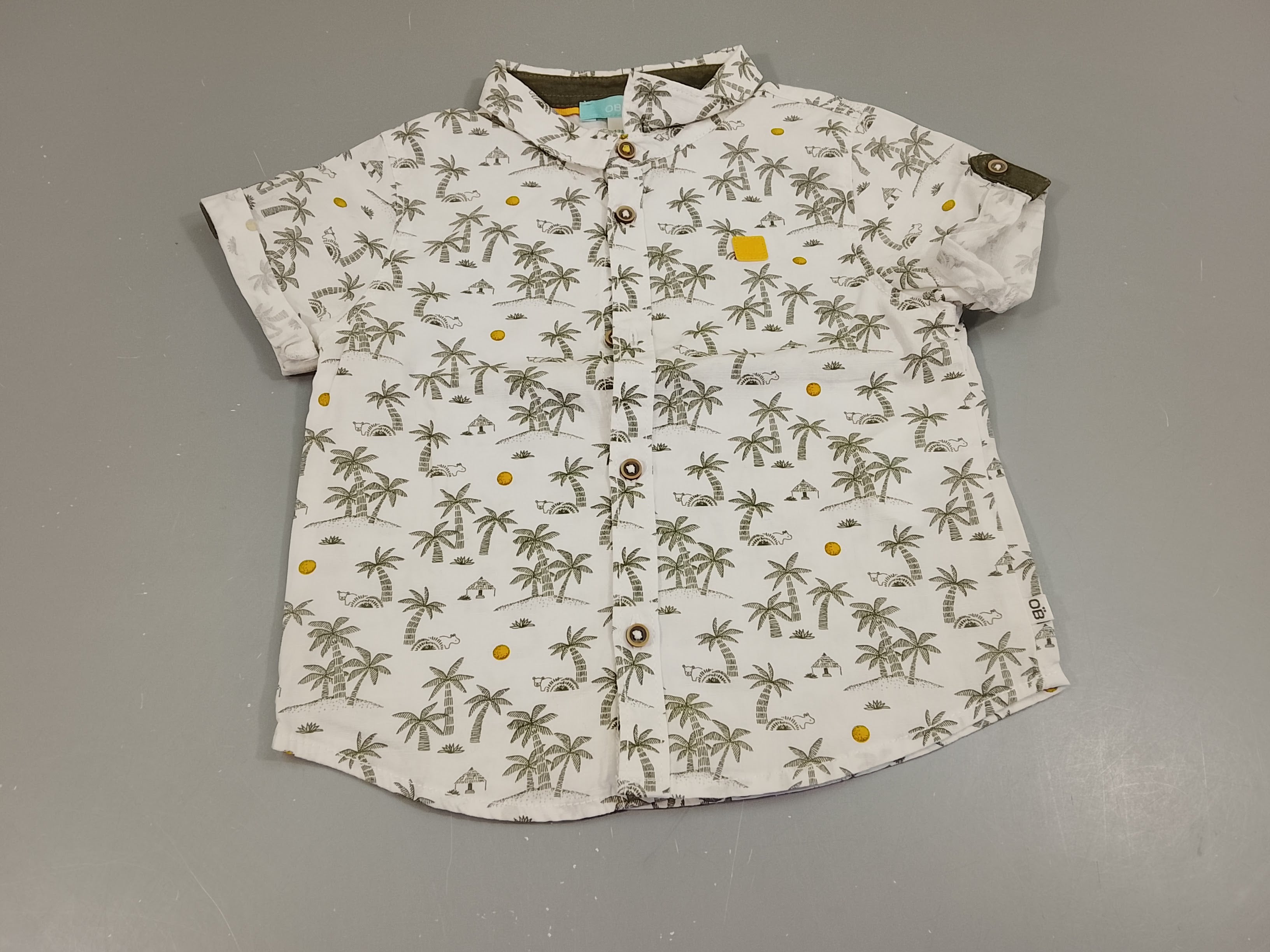Chemise m.c blanc texturé, motifs palmiers
