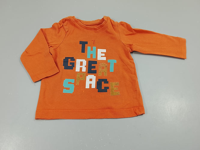 T-shirt m.l orange "the great space" (certains motifs éffacés), moins cher chez Petit Kiwi