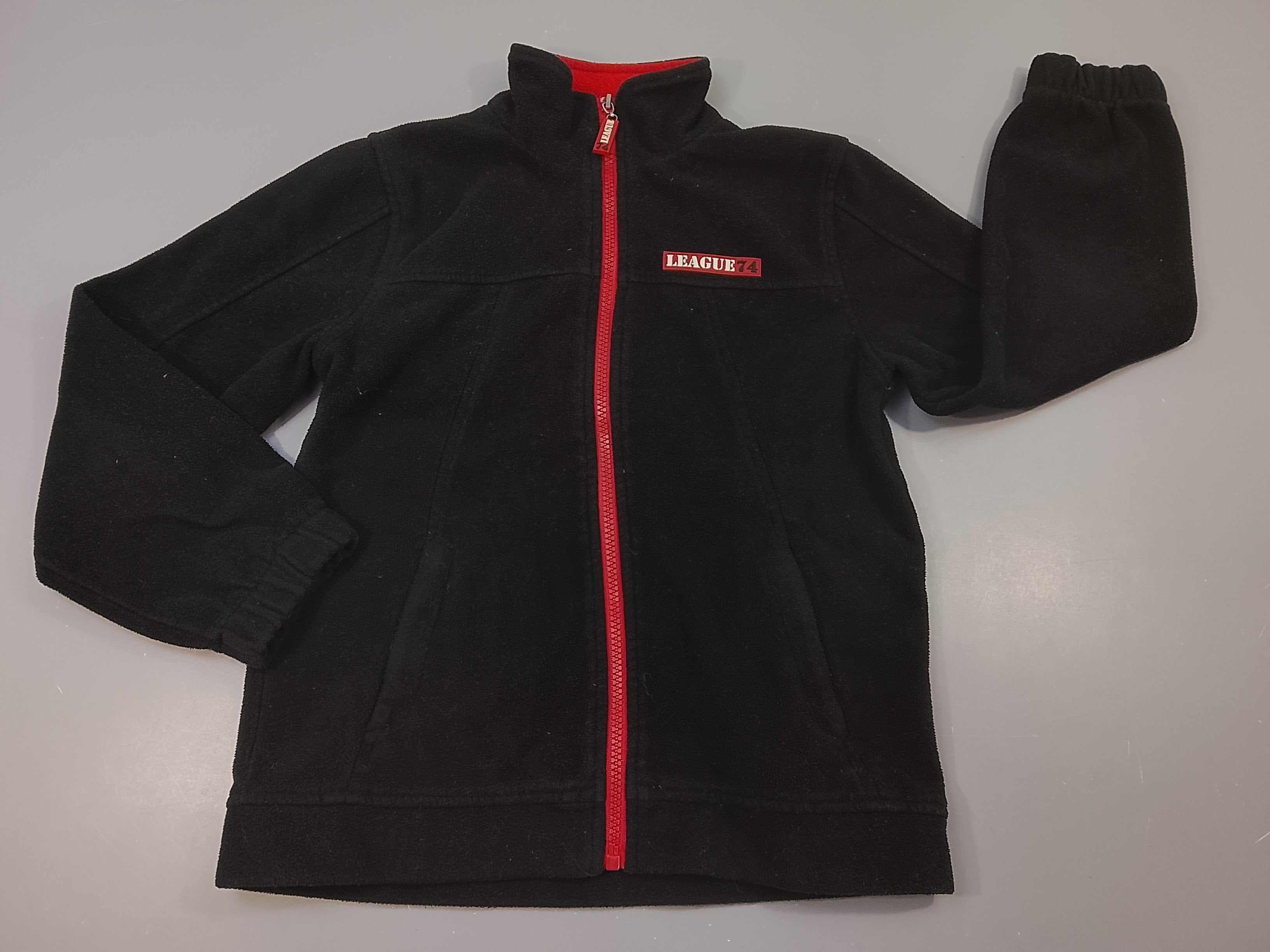 Polar zippé noir et rouge 