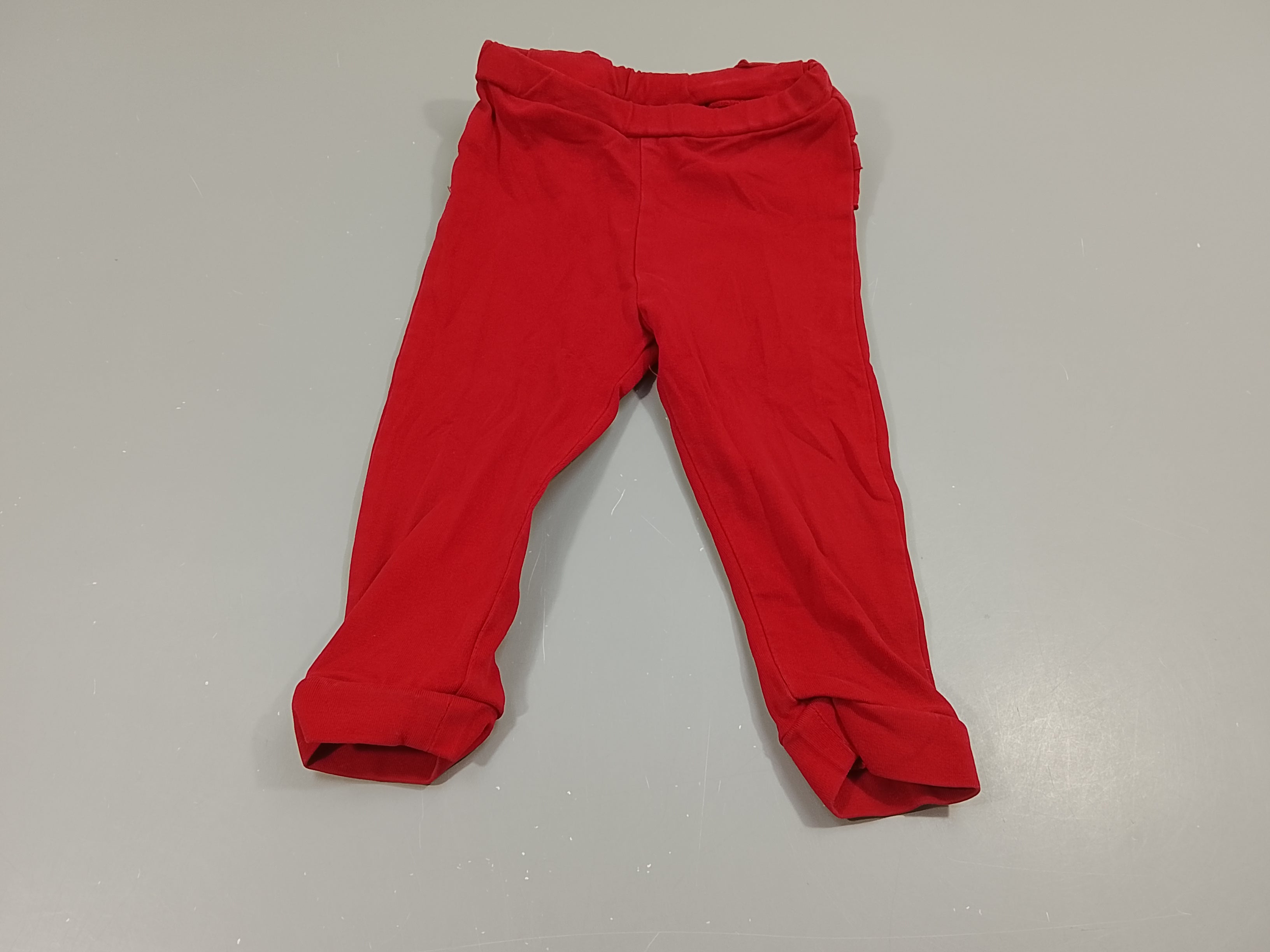 Legging rouge froufrous à la taille