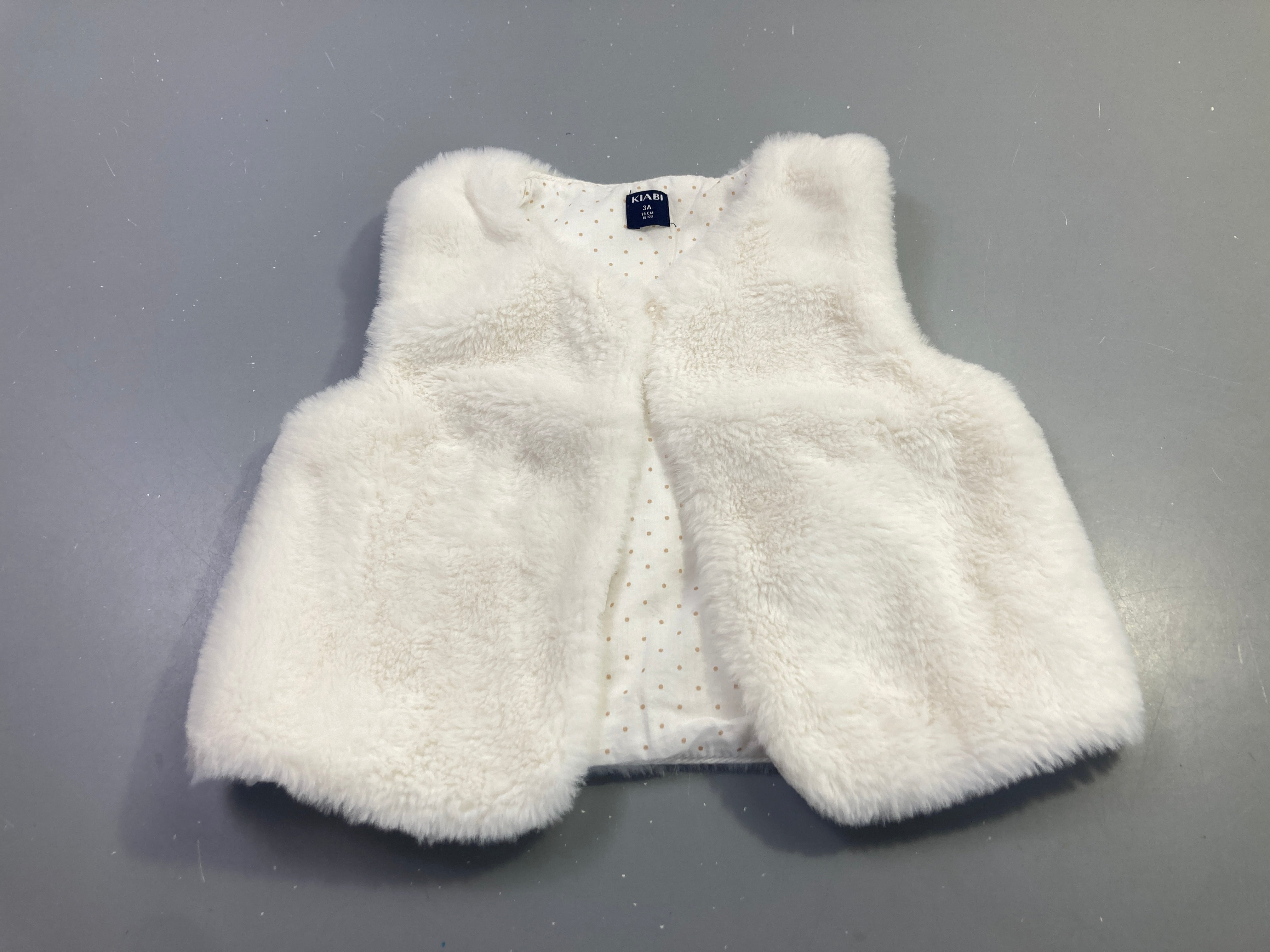 Gilet s.m écru fausse fourrure