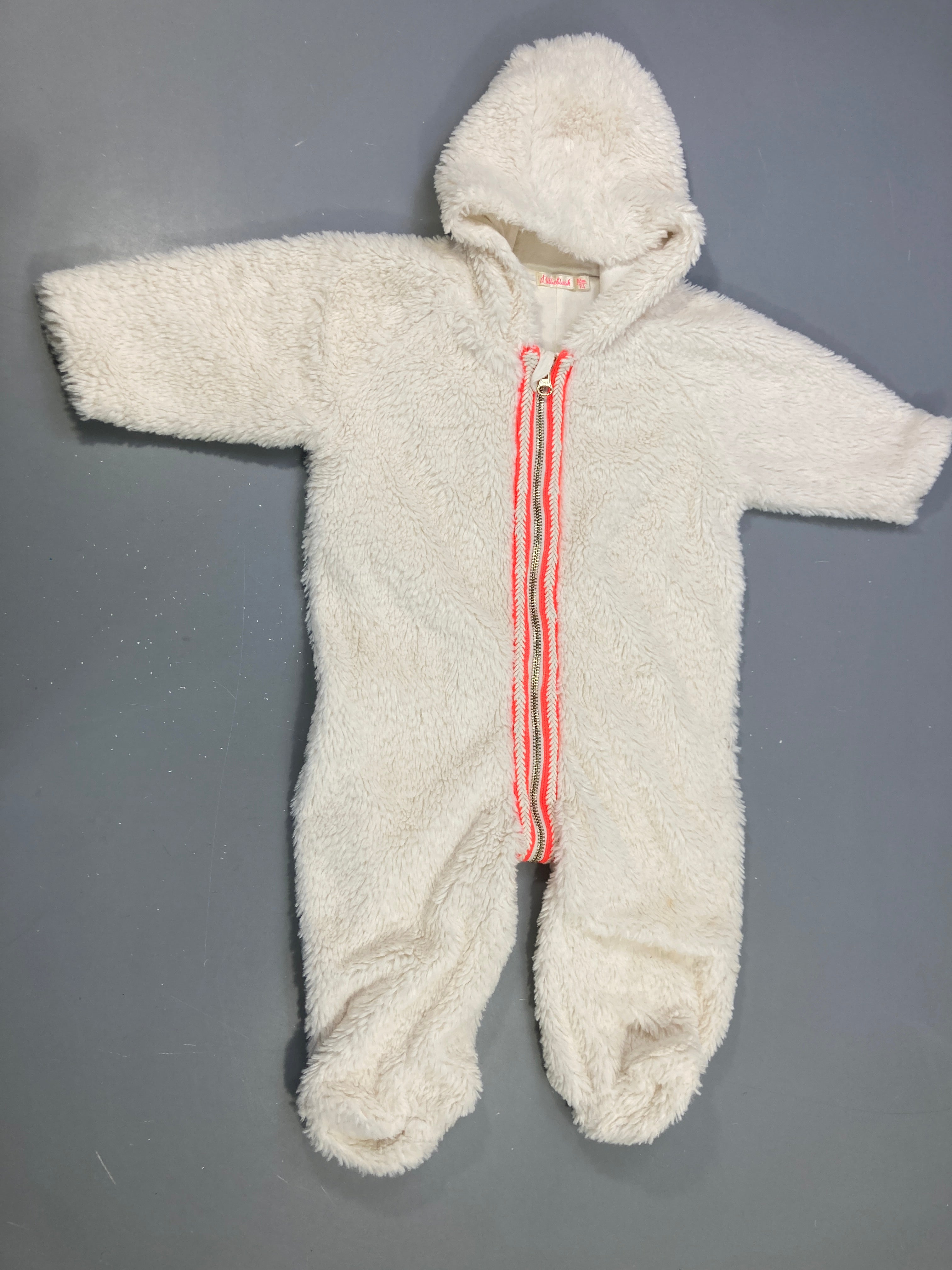 Combinaison pilote écrue fourrure synthétique zip corail