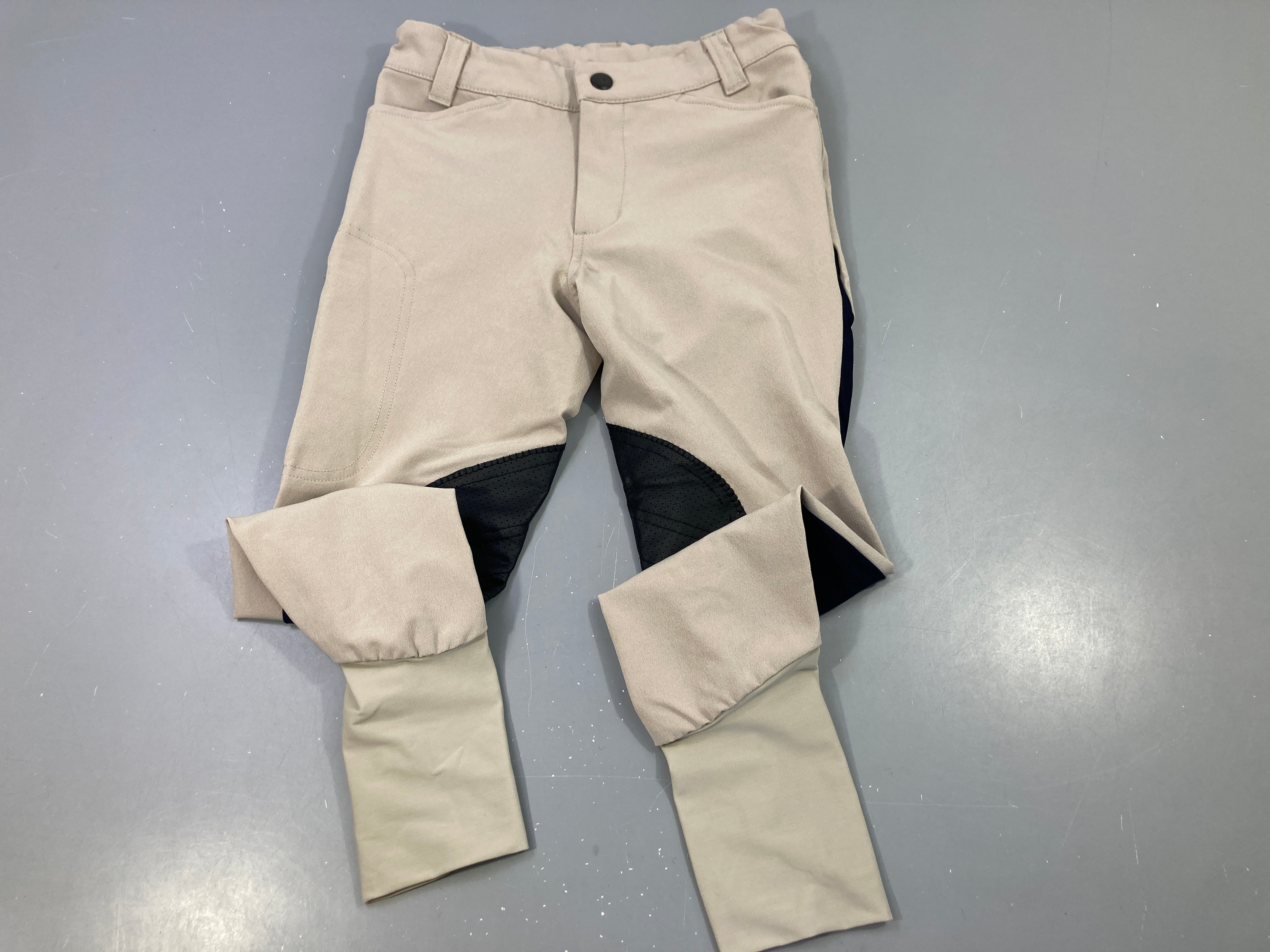 Pantalon d'équitation beige et noir, taille estimée
