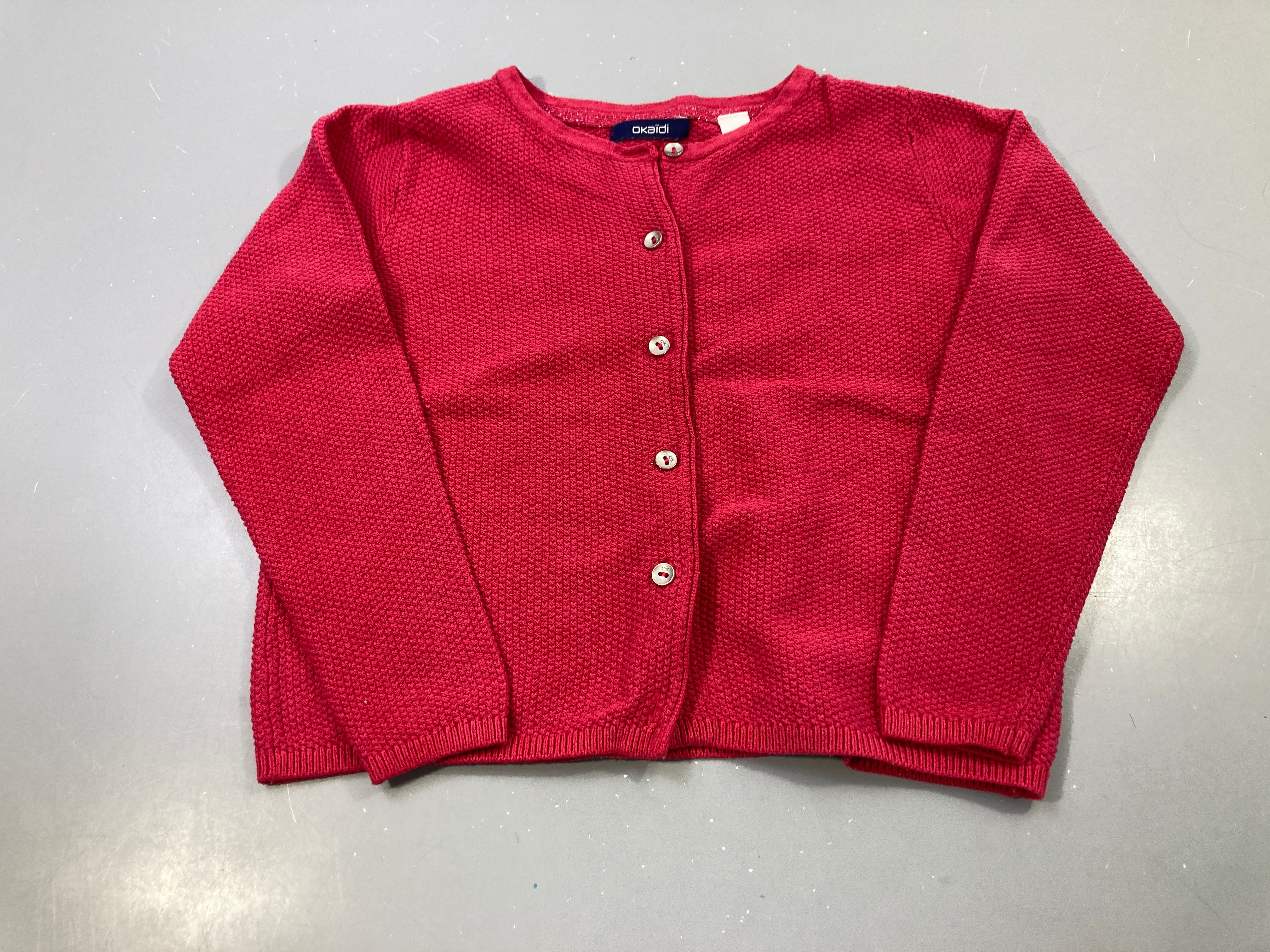 Gilet framboise texturé boutonné