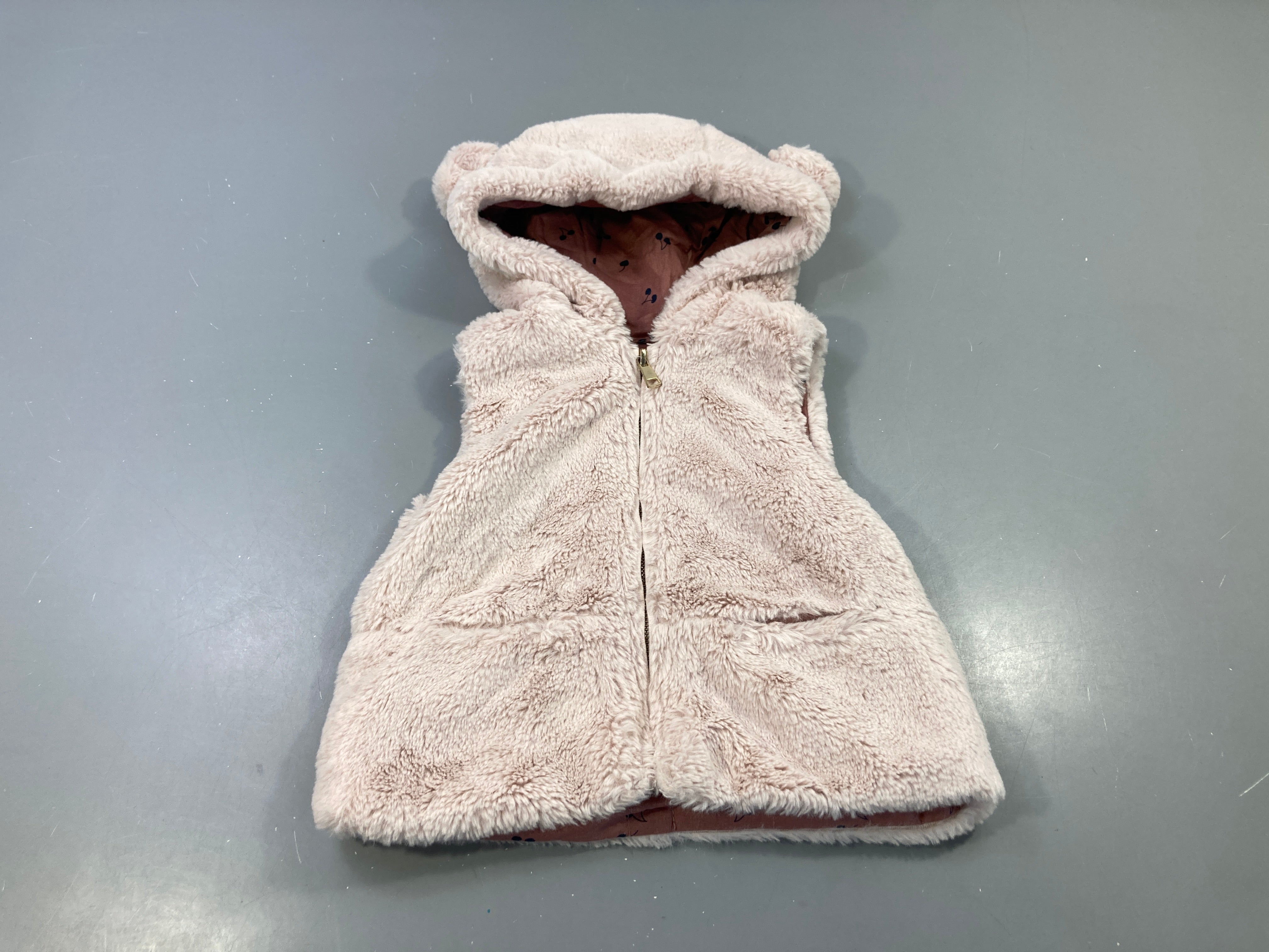 Gilet fausse fourrure s.m rose capuche zippé