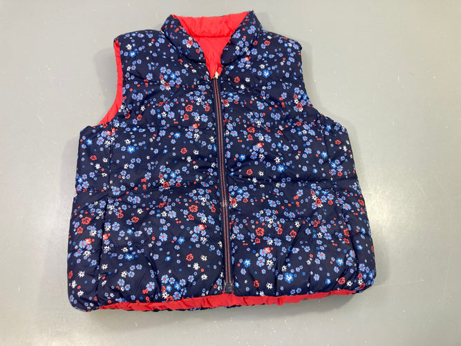 Bodywarmer réversible  bleu marine à fleur/ rose .  Tâché à relaver, moins cher chez Petit Kiwi