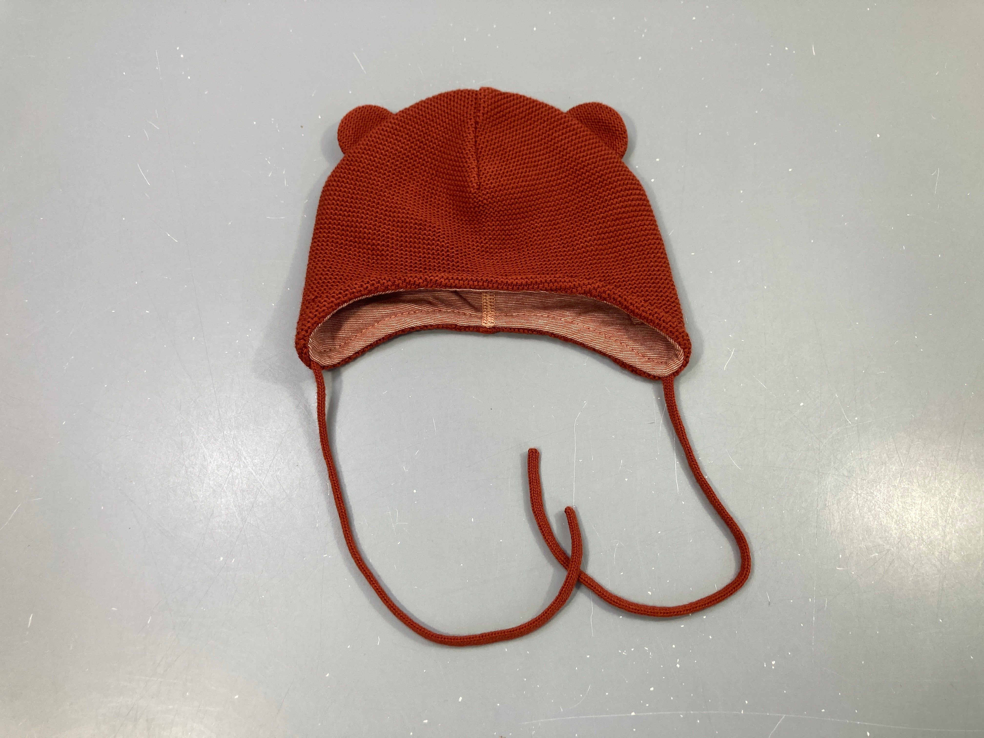 Bonnet tricot rouille, doublé jersey,  oreilles d'ours.